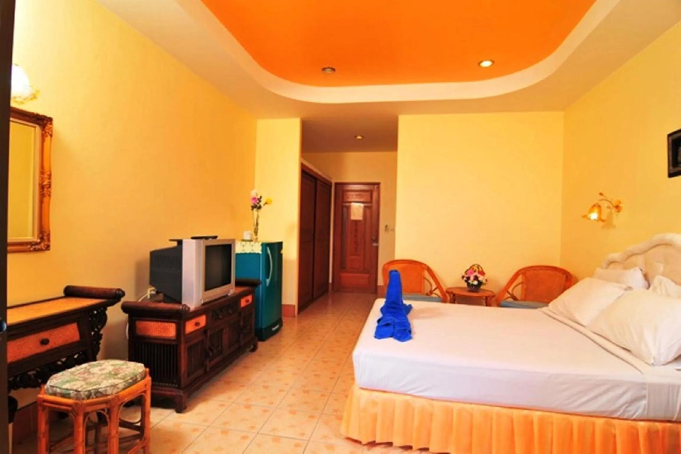 Bed in Baan Karon Hill Phuket Resort