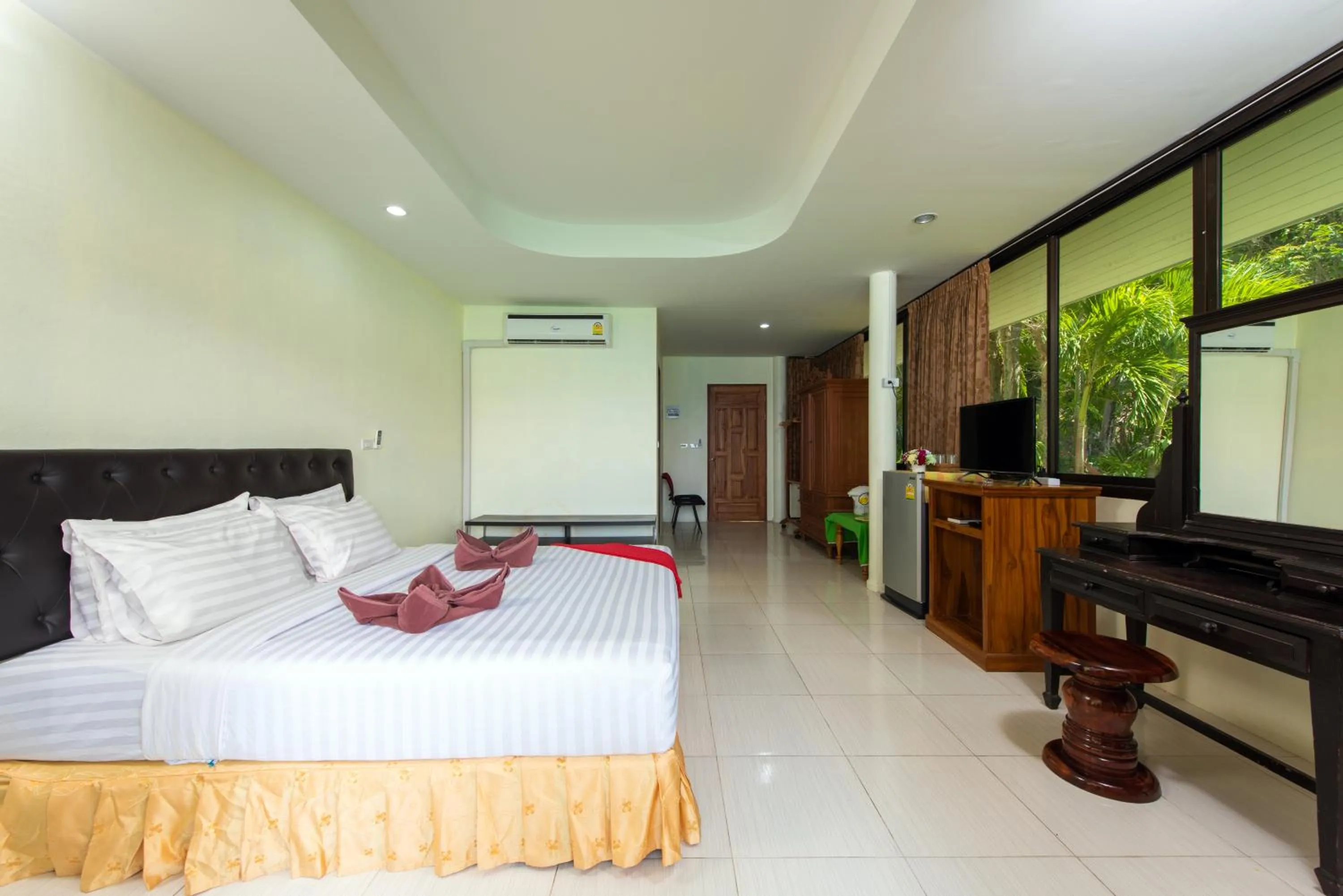 Bed in Baan Karon Hill Phuket Resort