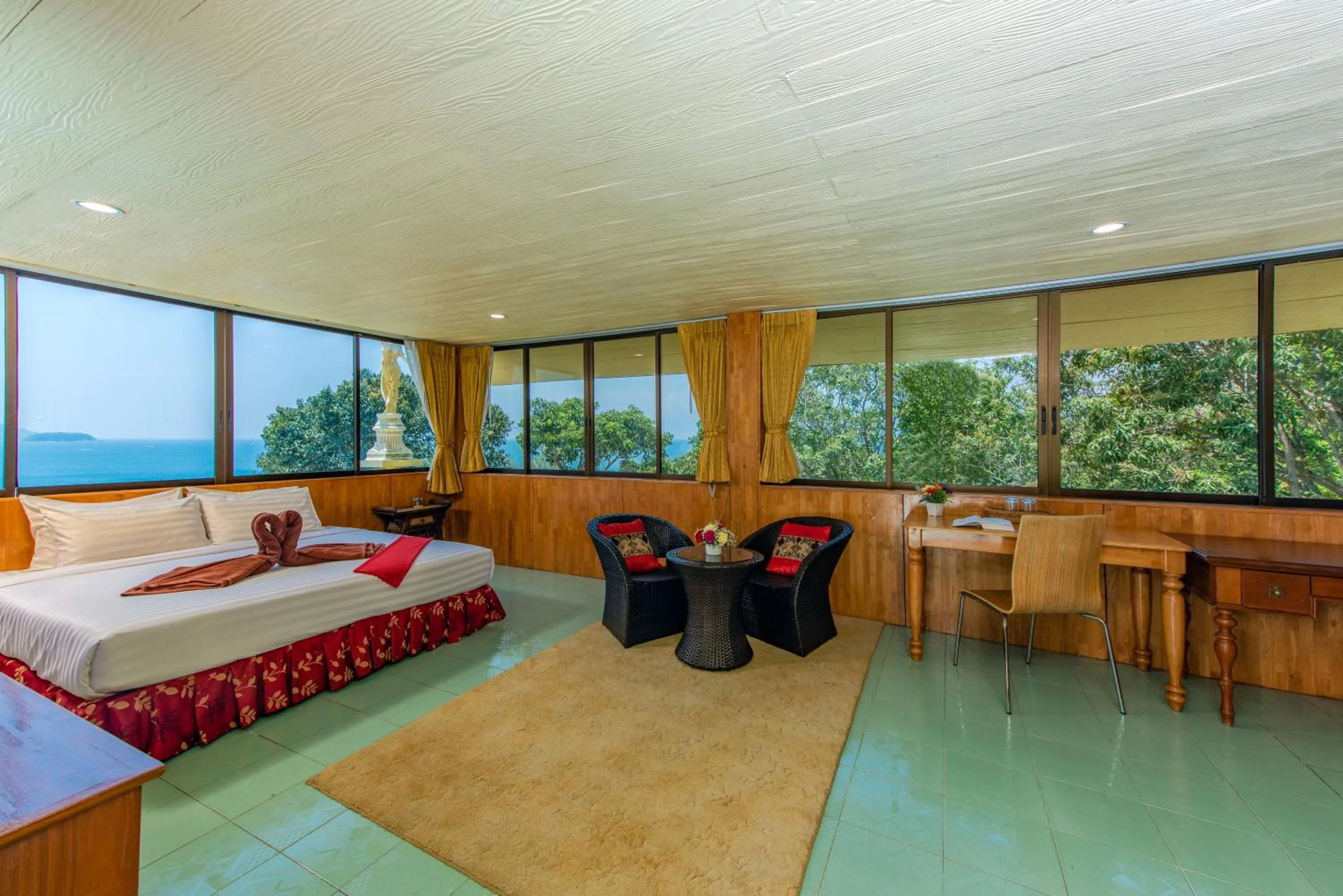 Bed in Baan Karon Hill Phuket Resort