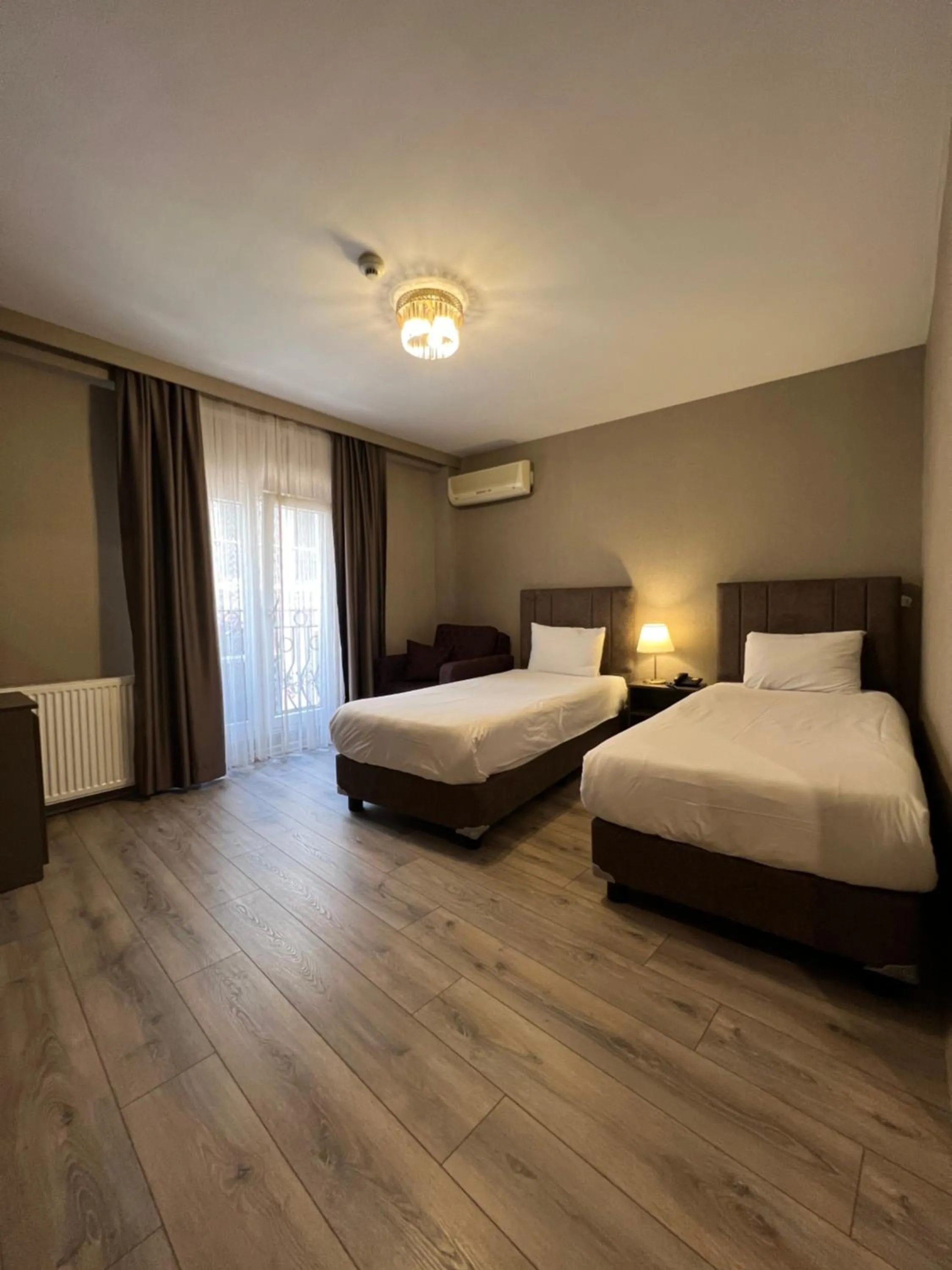 Bed in Flower Palace Hotel