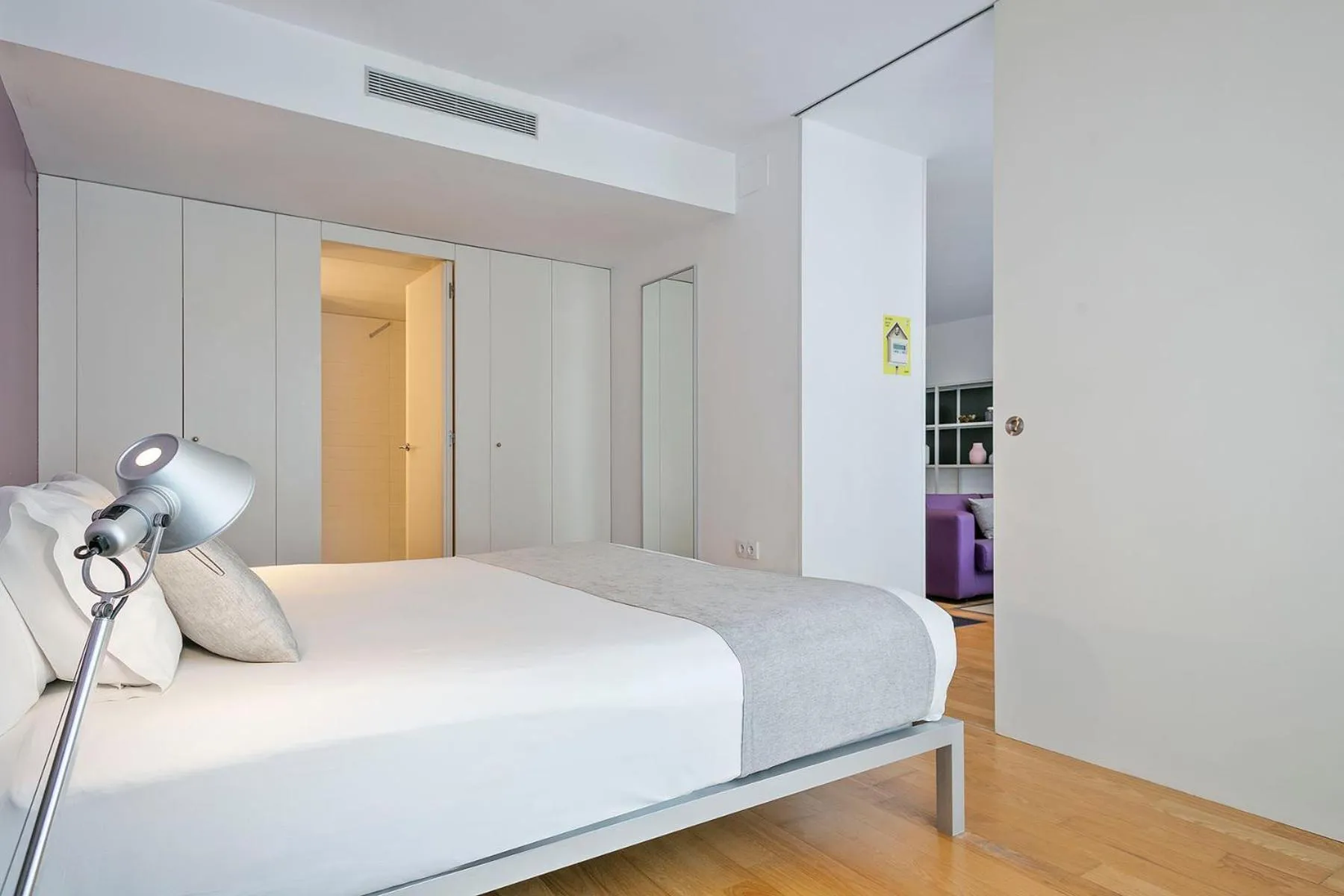 Bed in Lugaris Beach Apartments