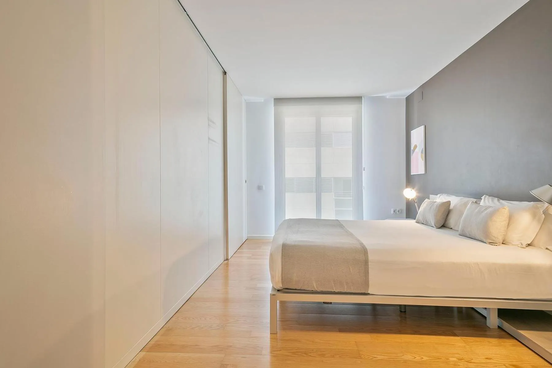 Bed in Lugaris Beach Apartments