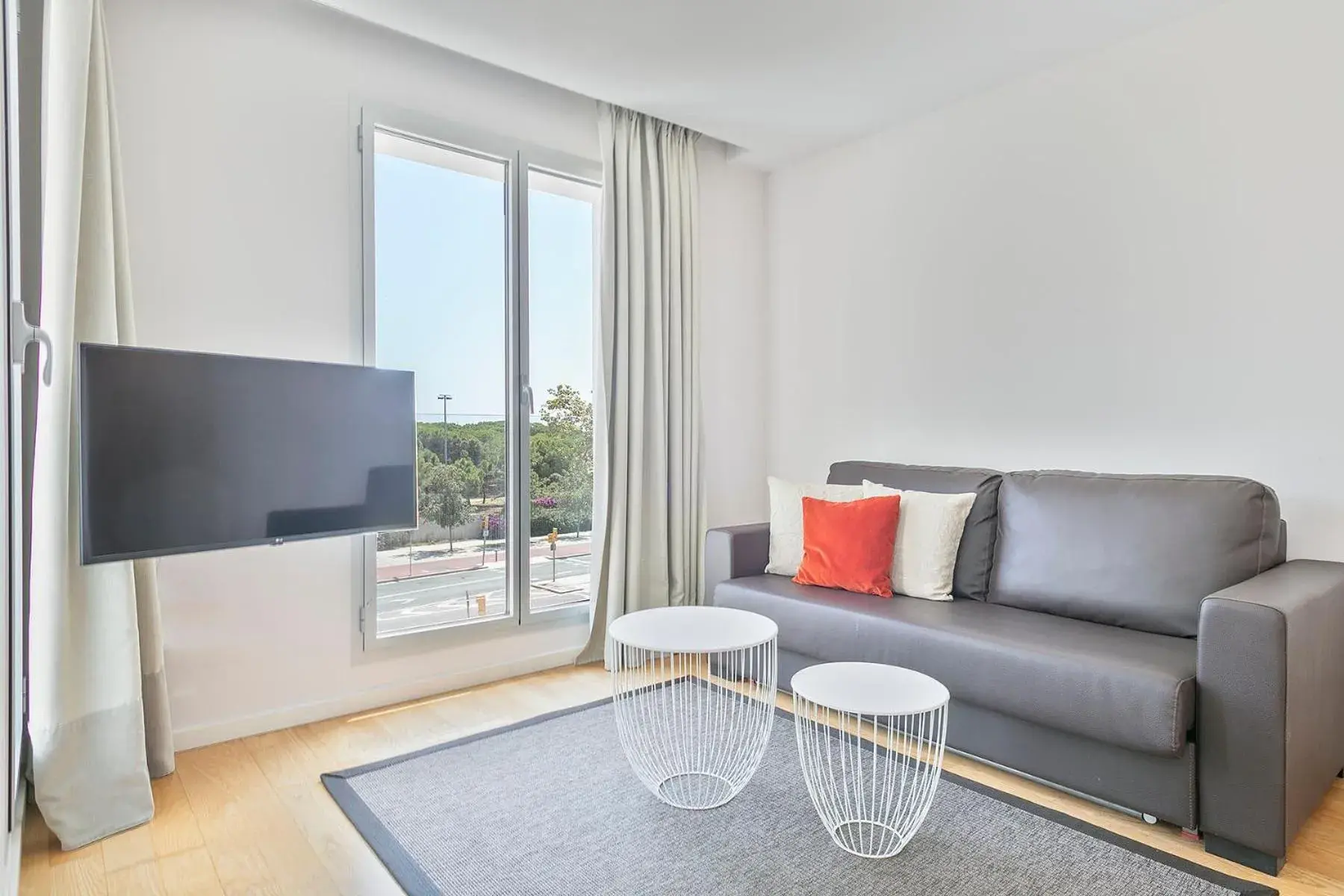 Living room in Lugaris Beach Apartments Living room in Lugaris Beach Apartments