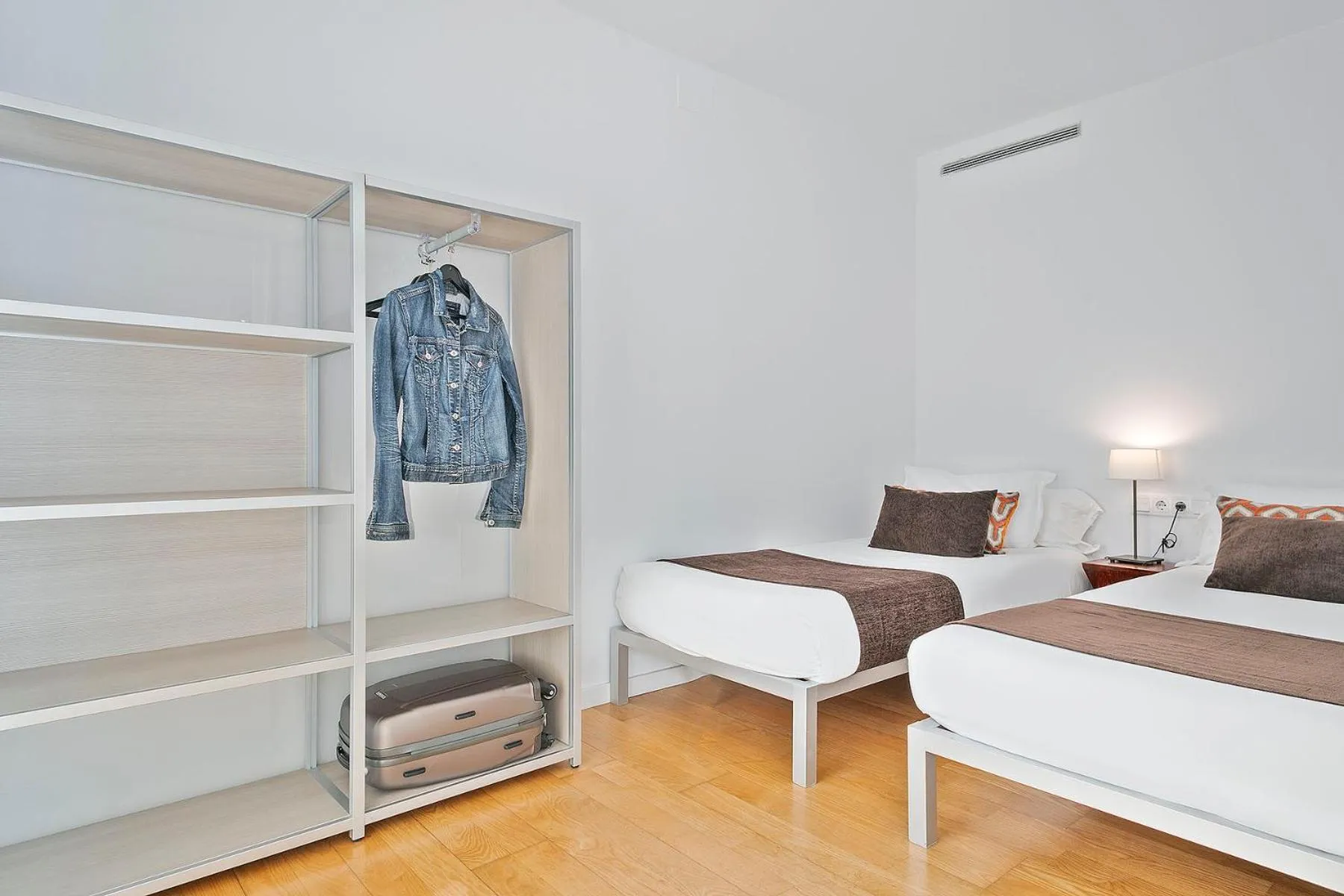 Bed in Lugaris Beach Apartments