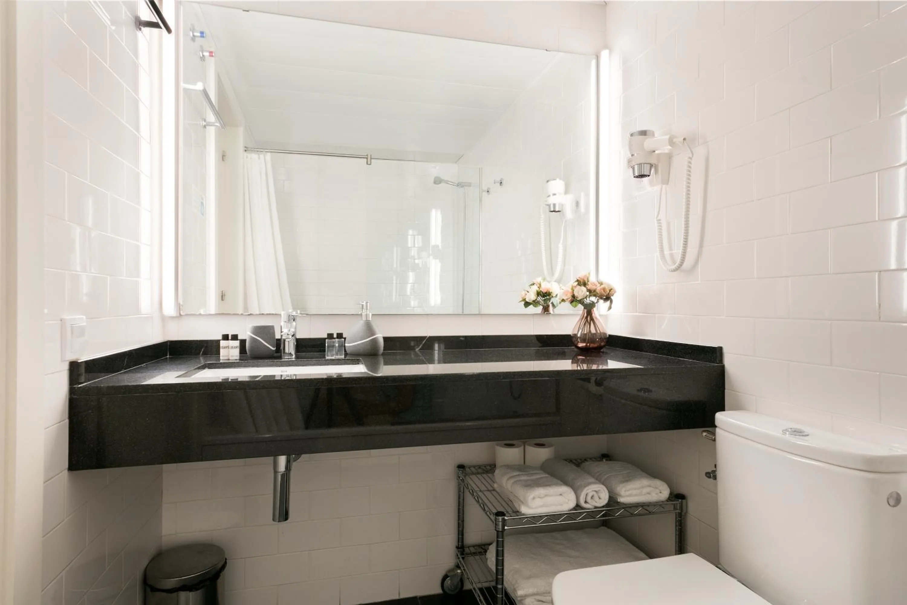 Bathroom in Lugaris Beach Apartments