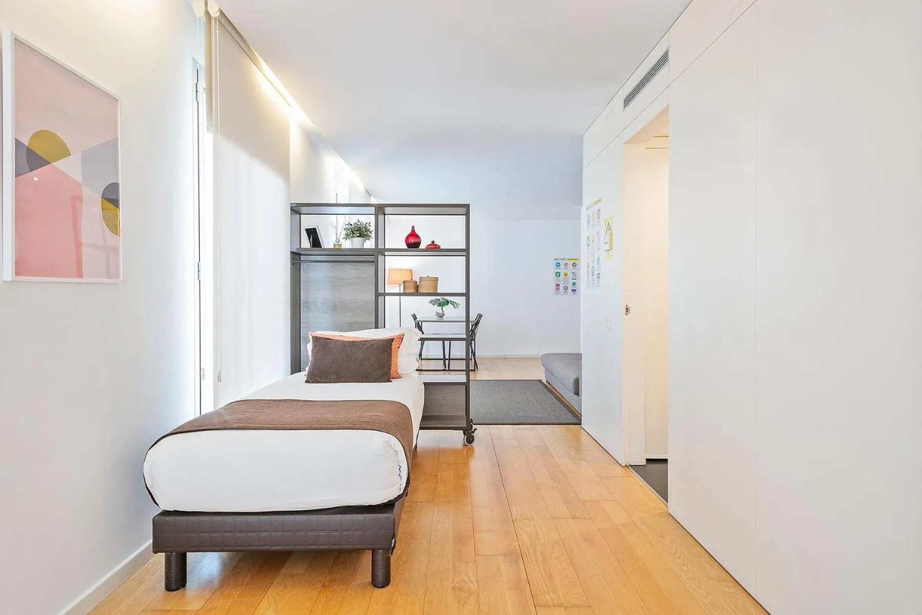 Bed in Lugaris Beach Apartments