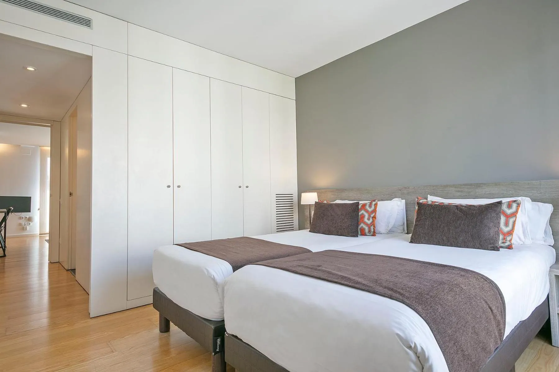 Bed in Lugaris Beach Apartments