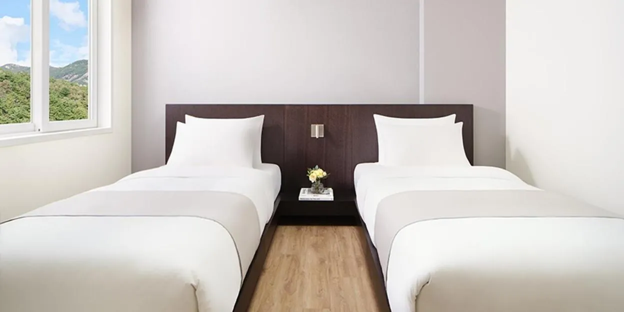 Bed in Hanwha Resort Sanjeong Lake Annecy