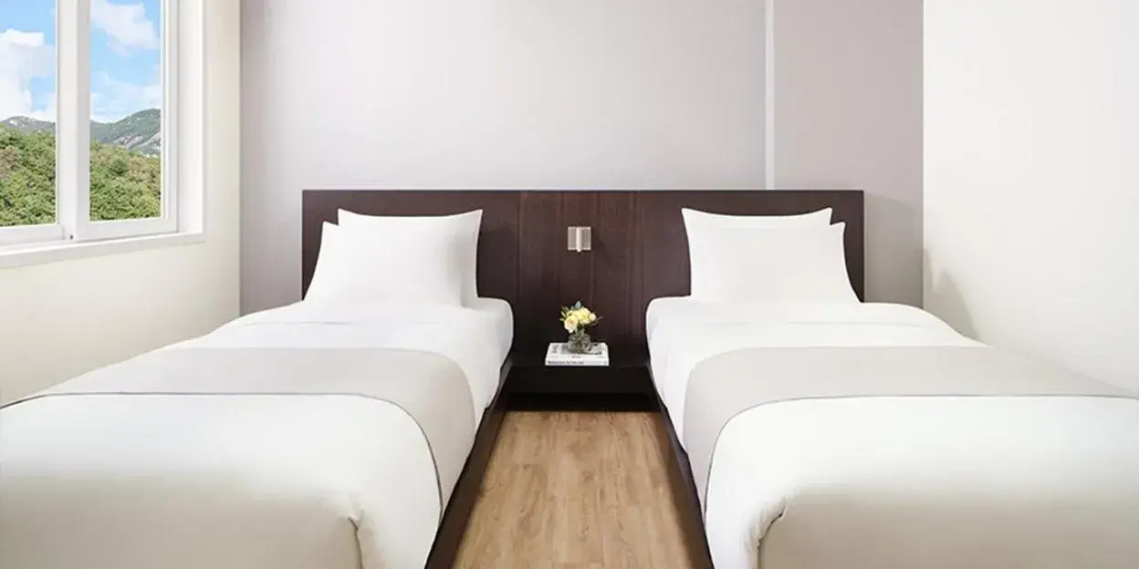 Bed in Hanwha Resort Sanjeong Lake Annecy Bed in Hanwha Resort Sanjeong Lake Annecy