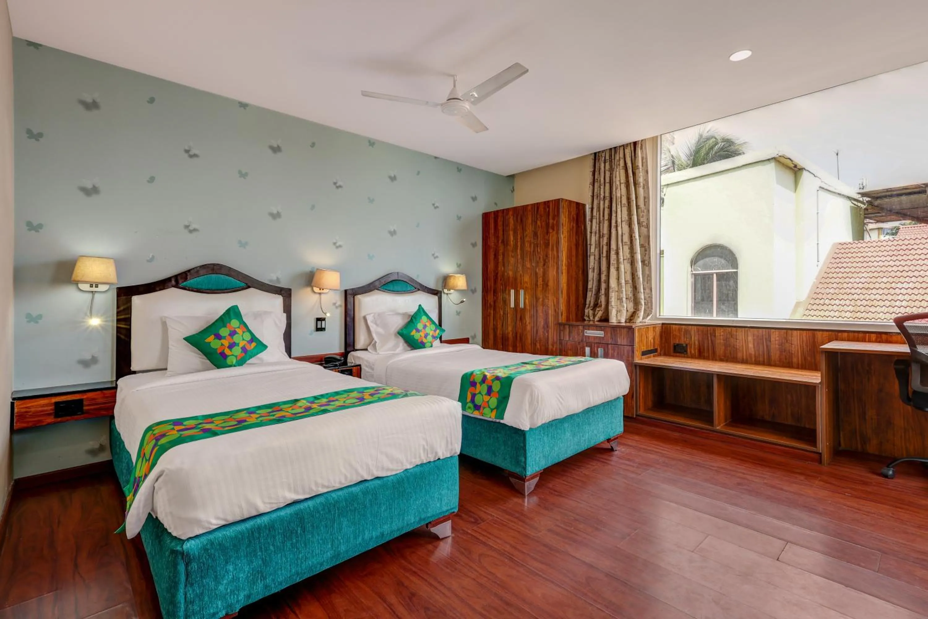 Bedroom in Treebo Blak & Wite Rk Beach