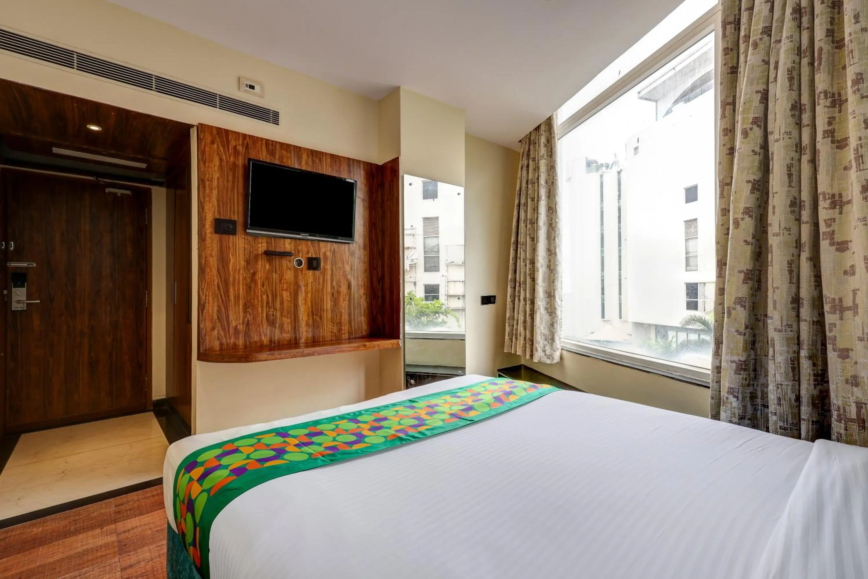 Bedroom in Treebo Blak & Wite Rk Beach