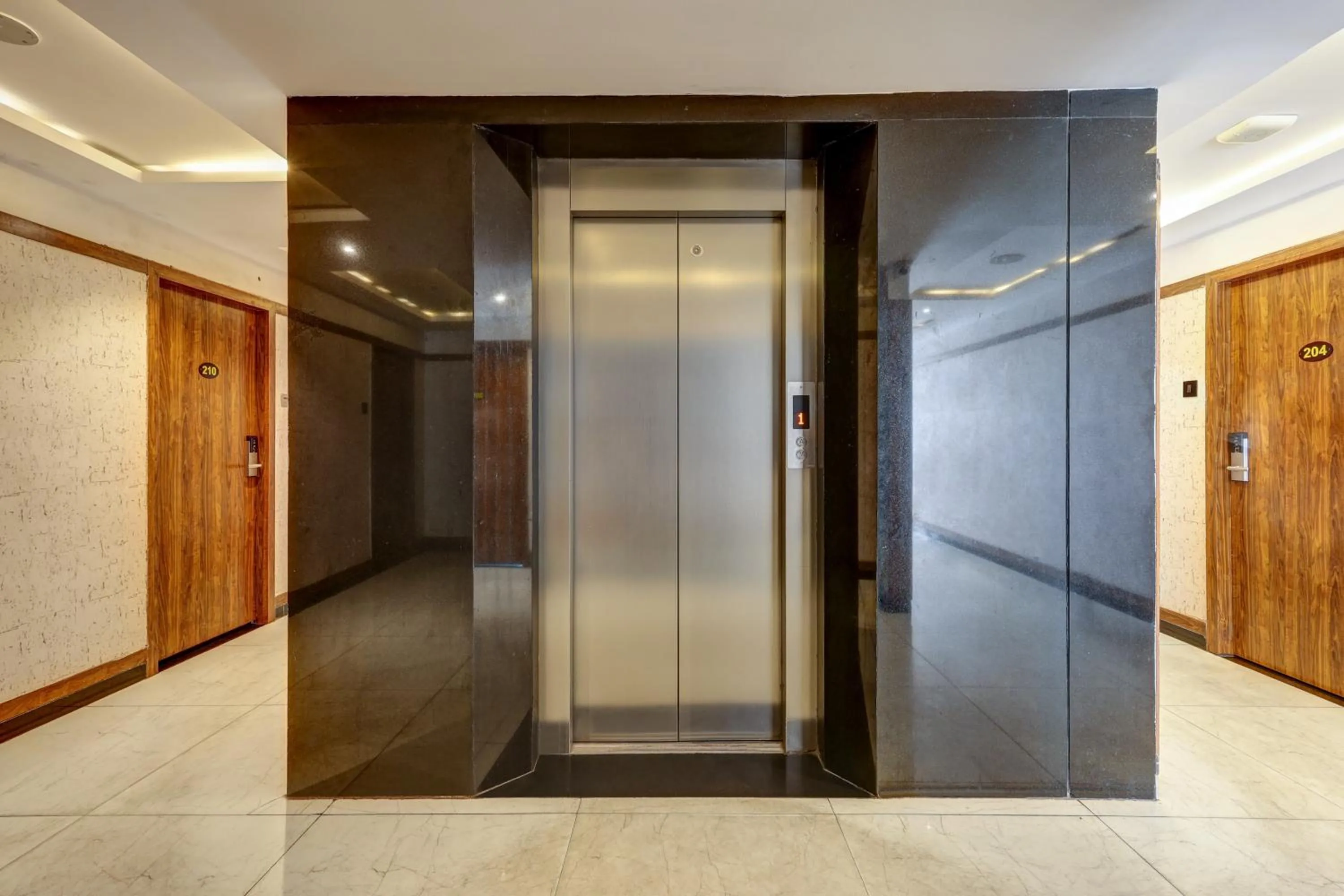 elevator in Treebo Blak & Wite Rk Beach