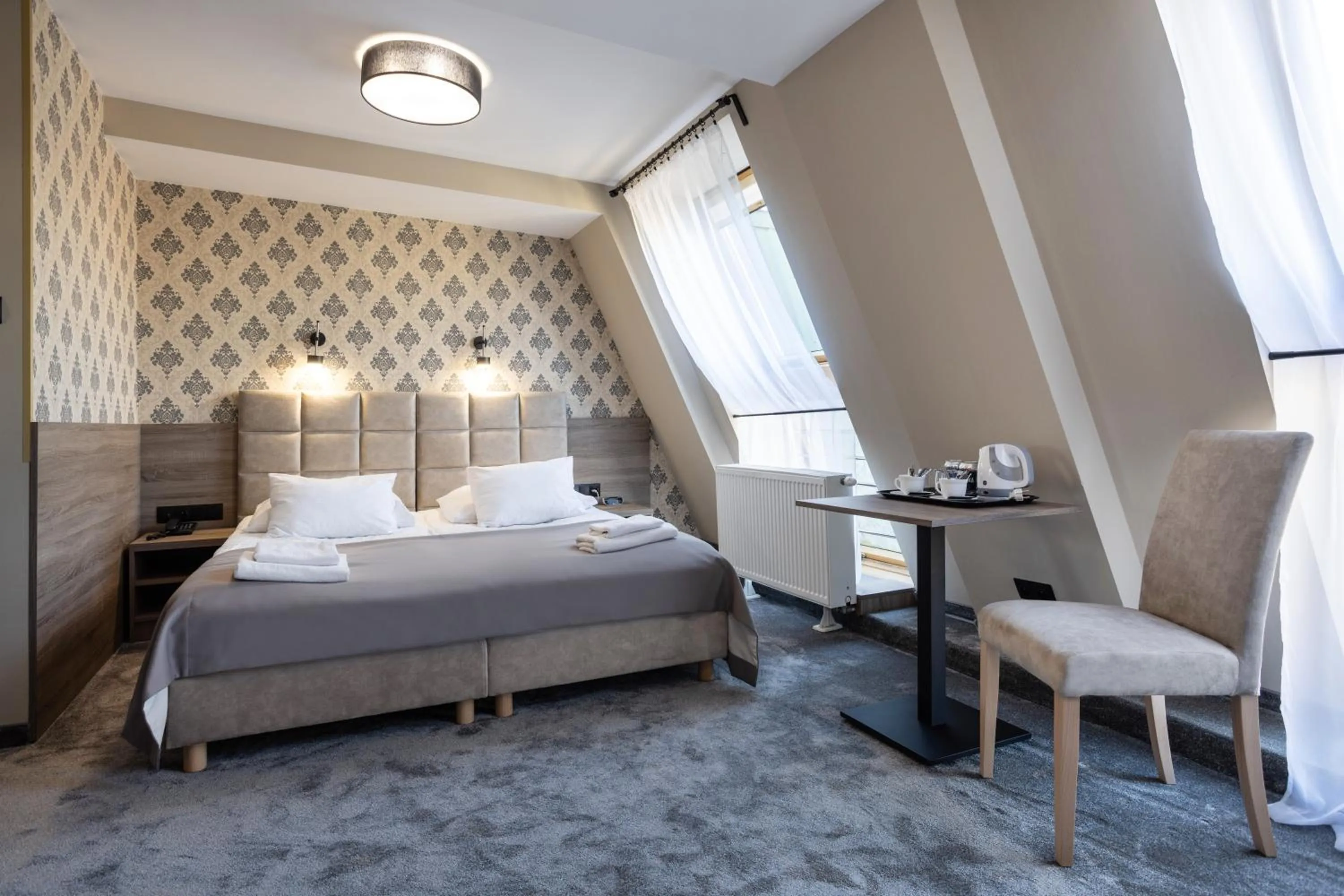 Bed in Hotel Maksymilian