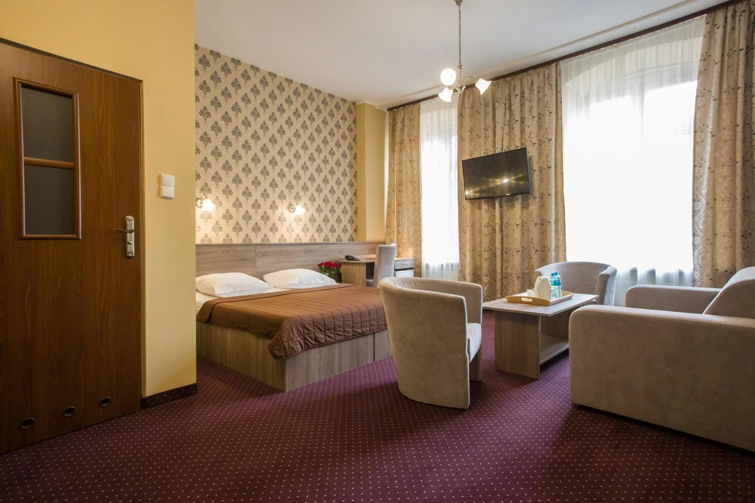 Bed in Hotel Maksymilian