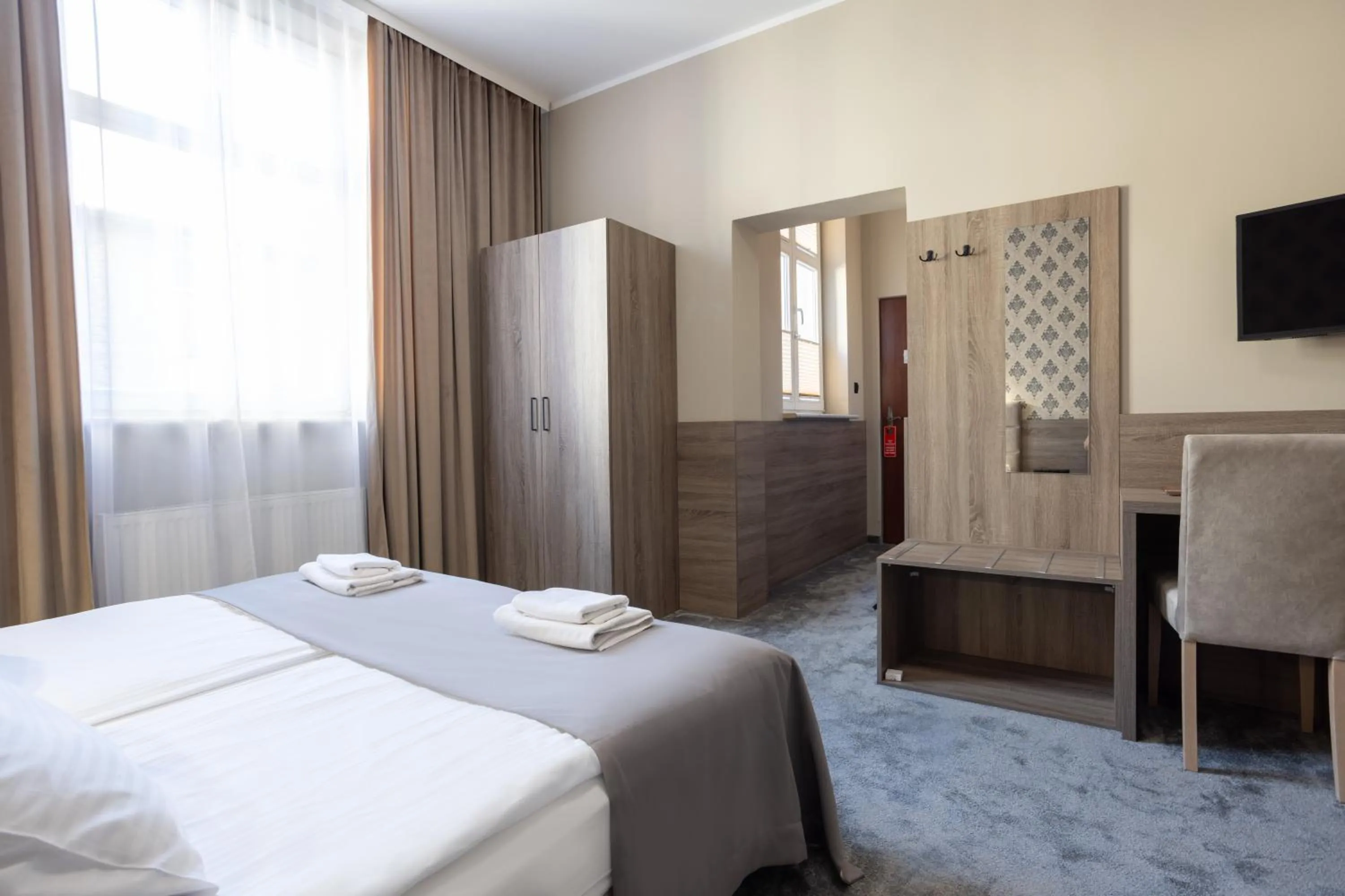 Bed in Hotel Maksymilian