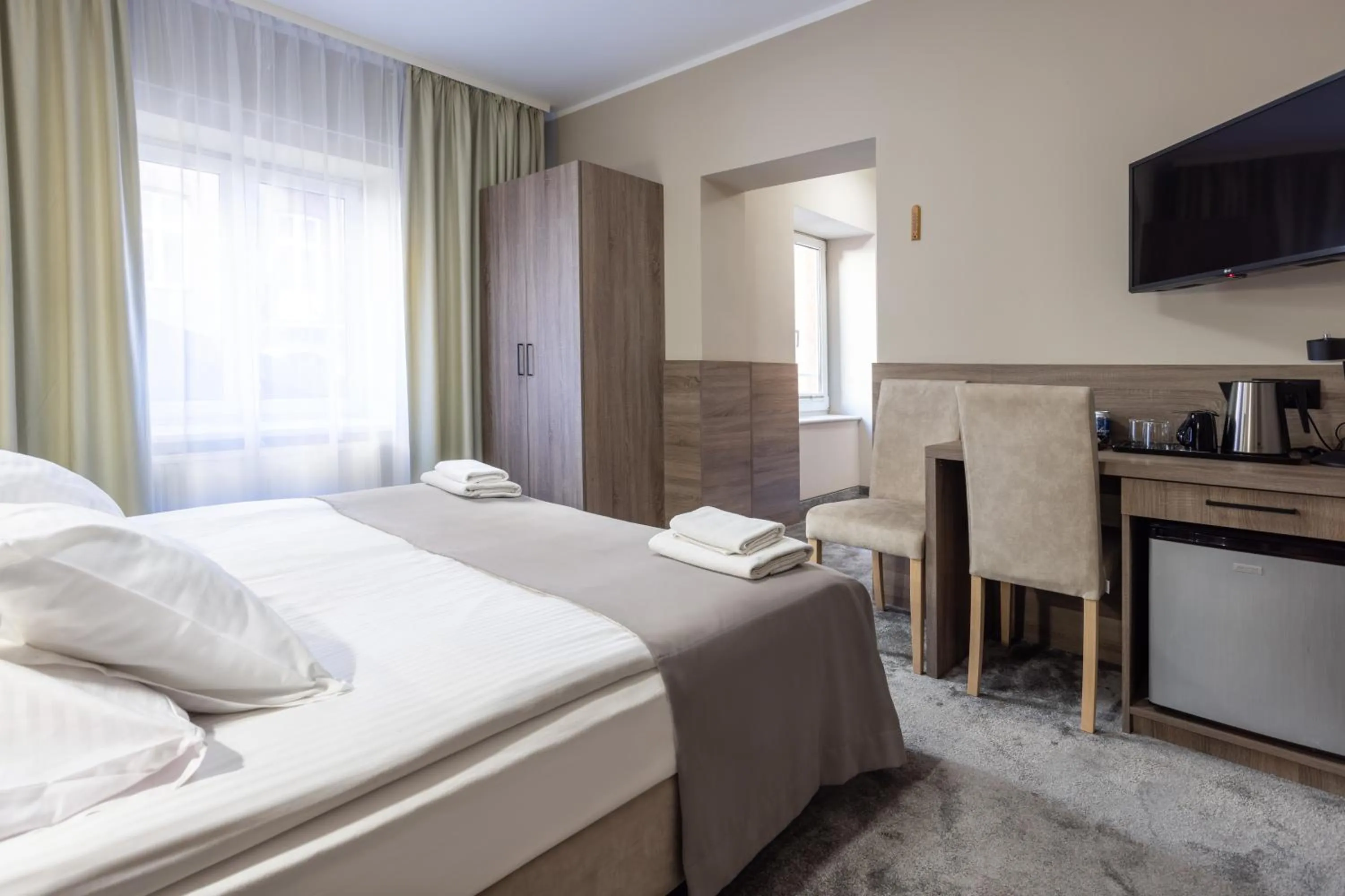 Bed in Hotel Maksymilian