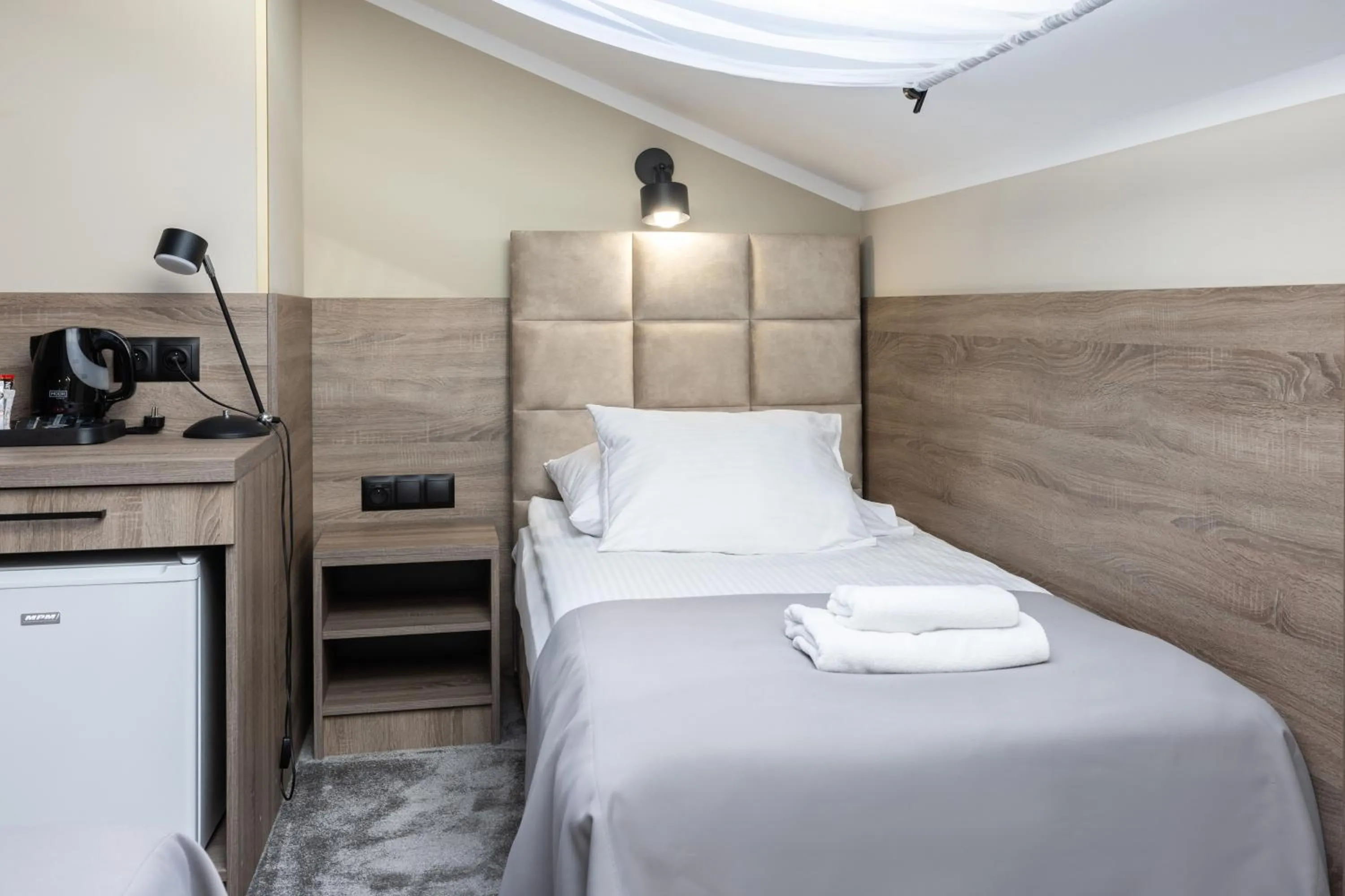 Bed in Hotel Maksymilian