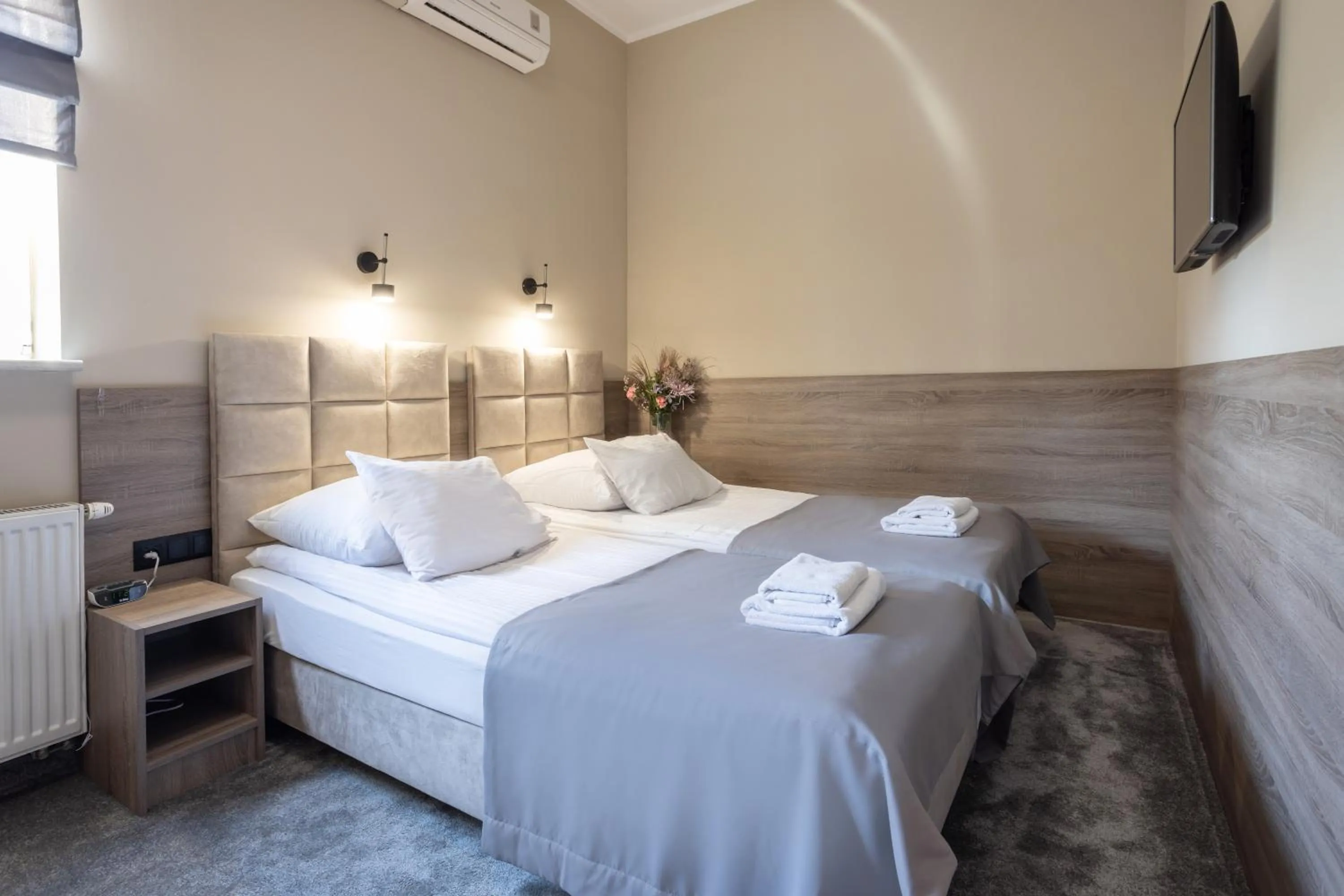 Bed in Hotel Maksymilian