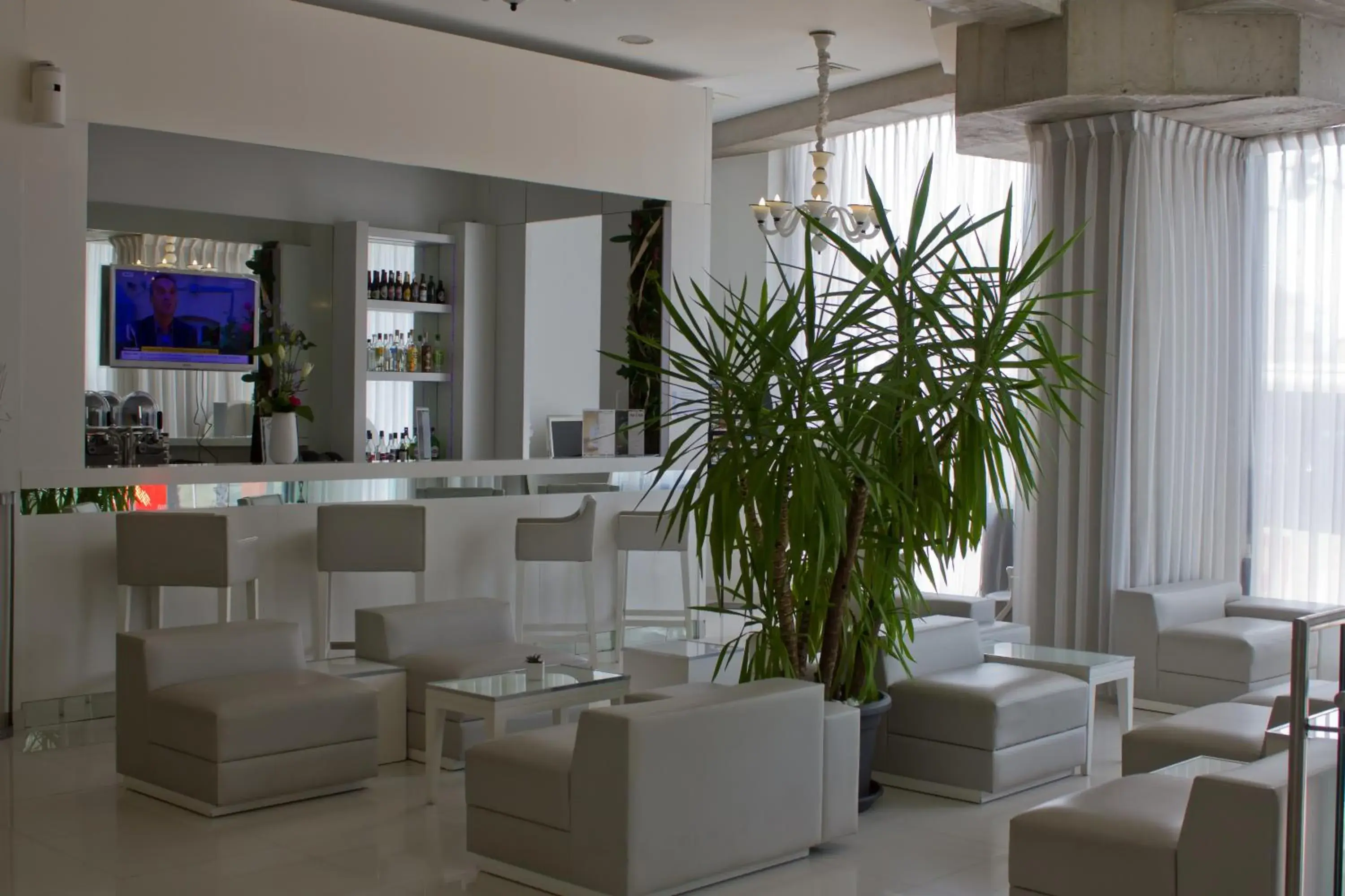 Lounge or bar in Kyriad Prestige Perpignan Centre Gare Lounge or bar in Kyriad Prestige Perpignan Centre Gare