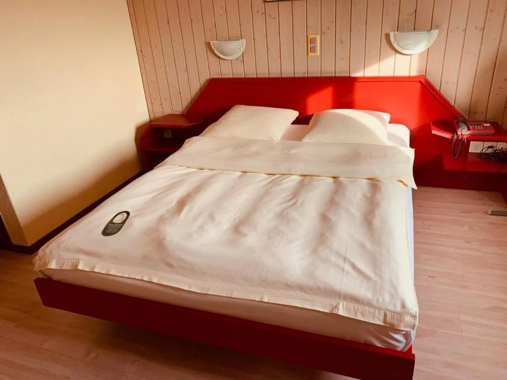 Bed in Hotel Lyssach