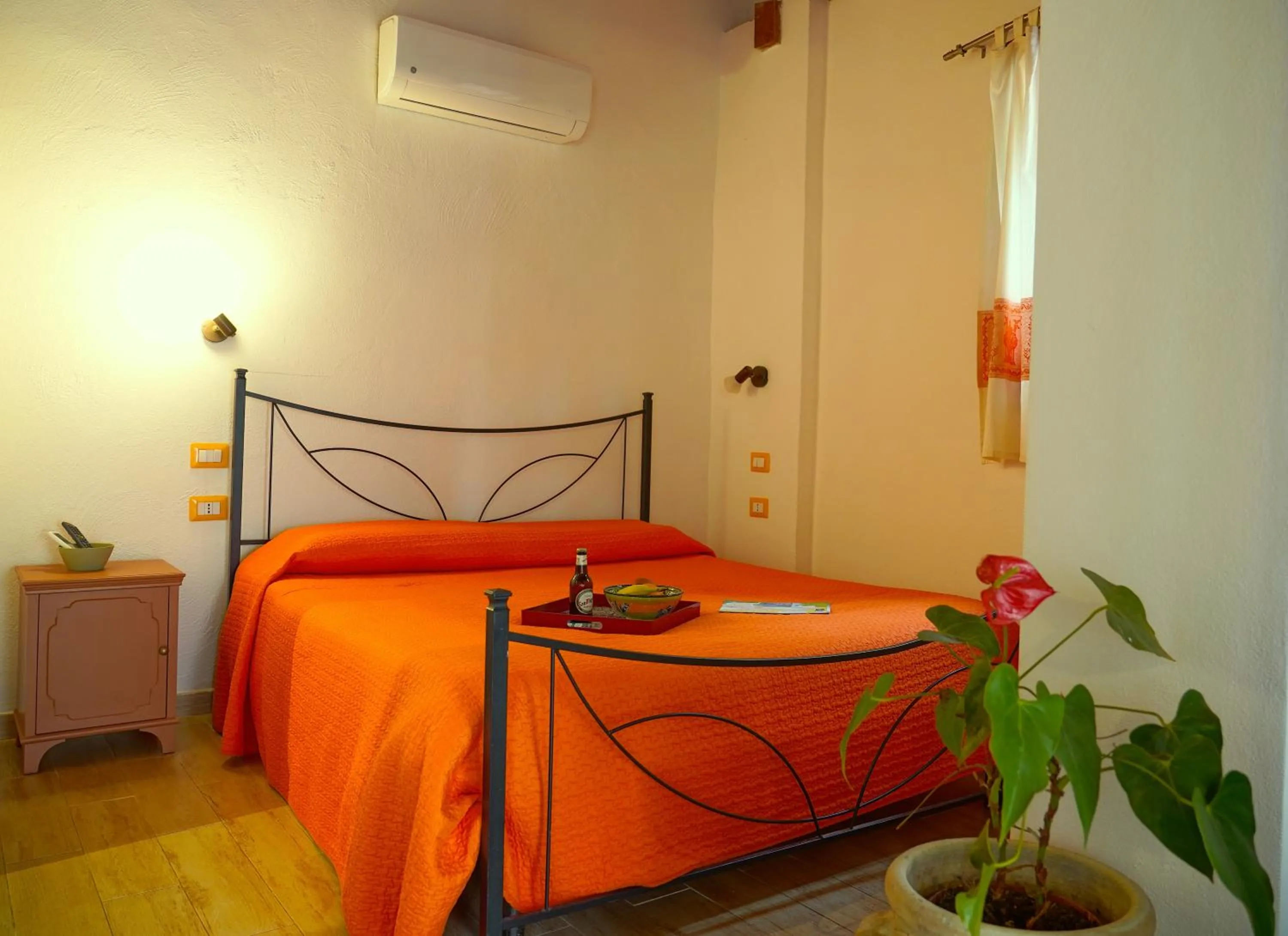 Bed in Flowery Inn Villa