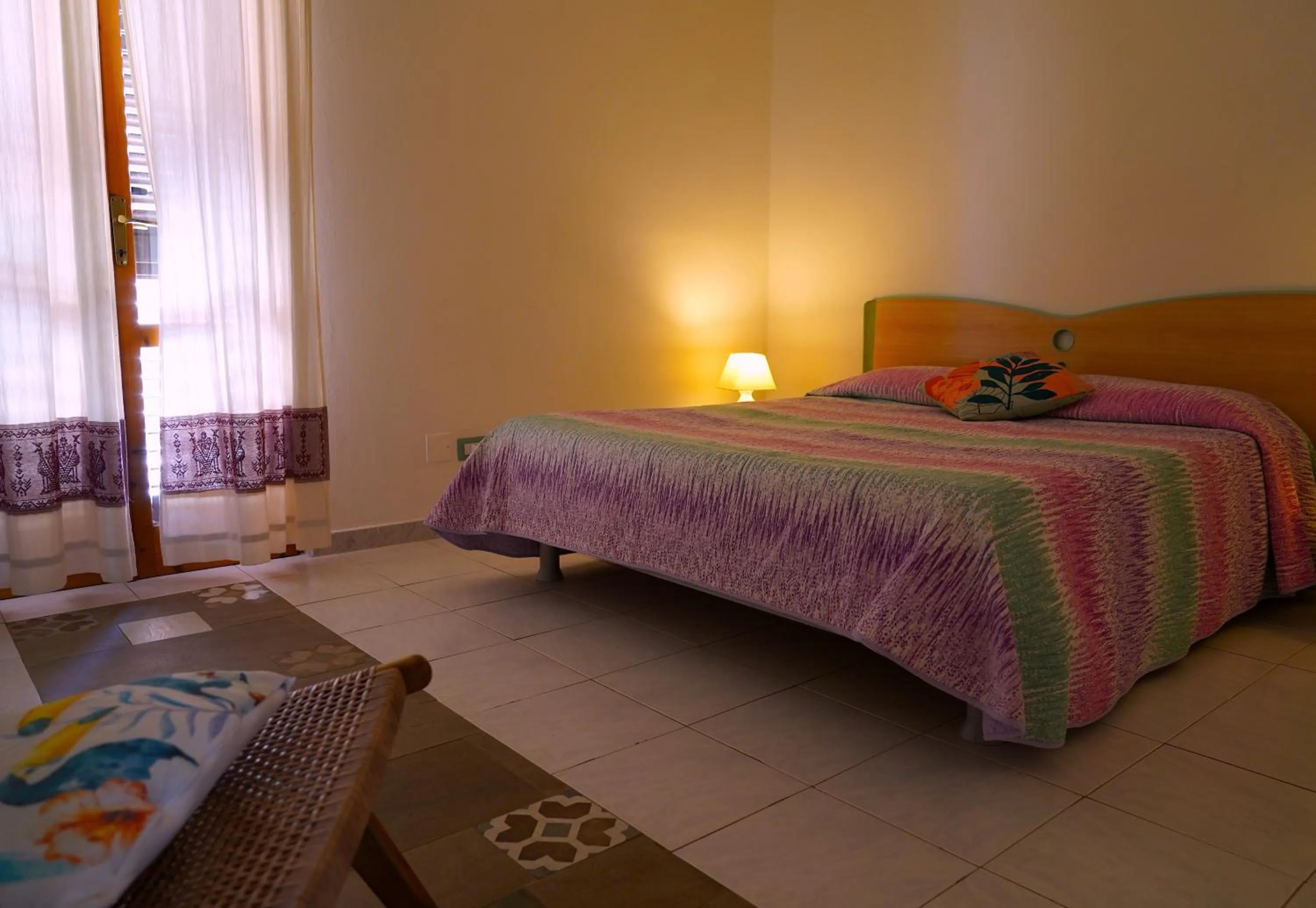 Bed in Flowery Inn Villa