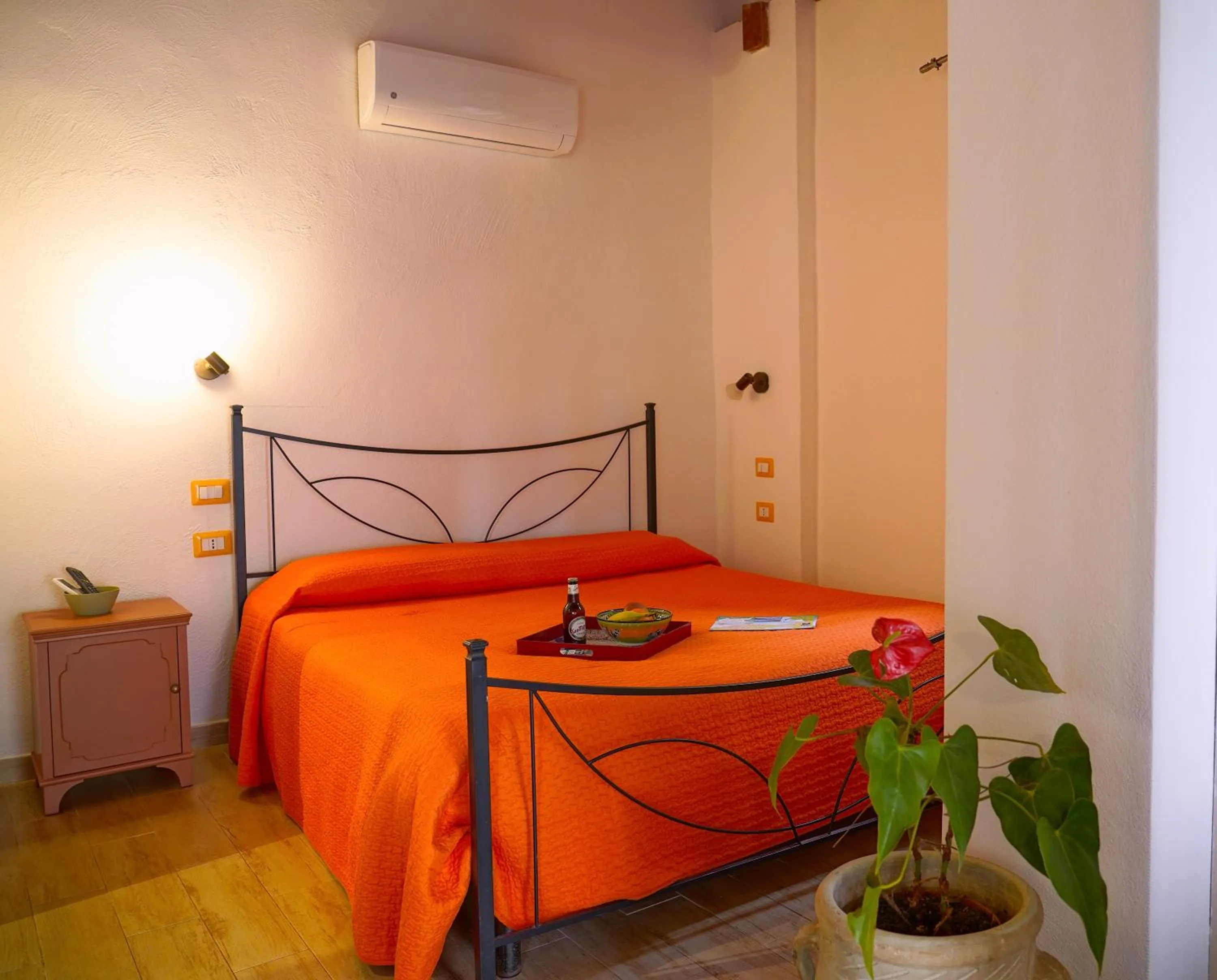 Bed in Flowery Inn Villa