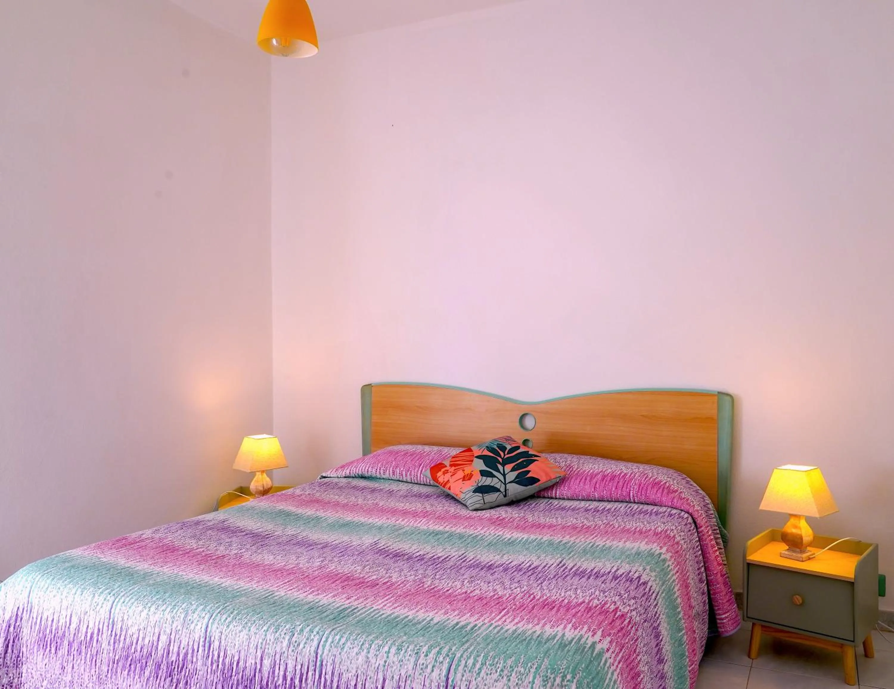 Bed in Flowery Inn Villa