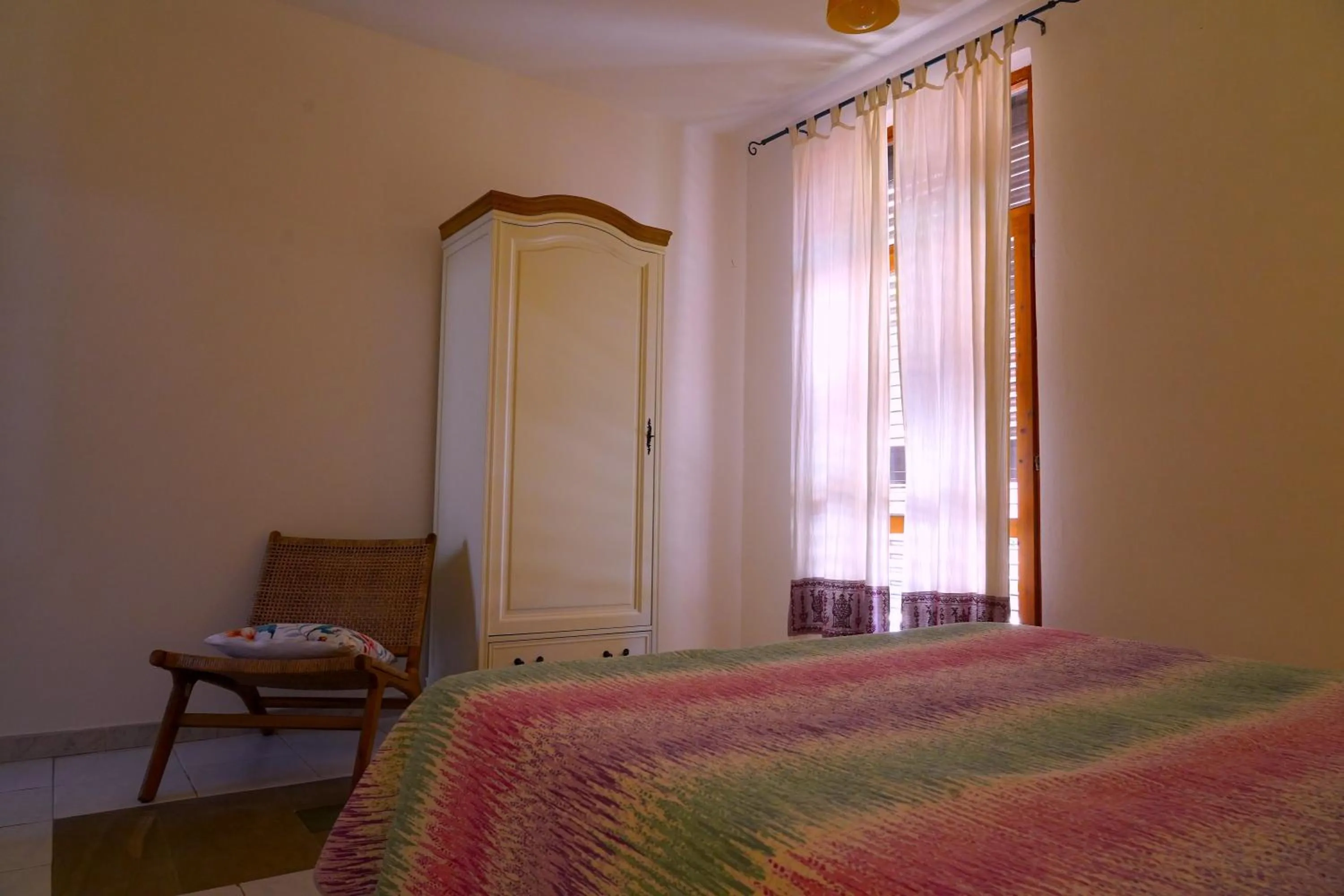 Bed in Flowery Inn Villa