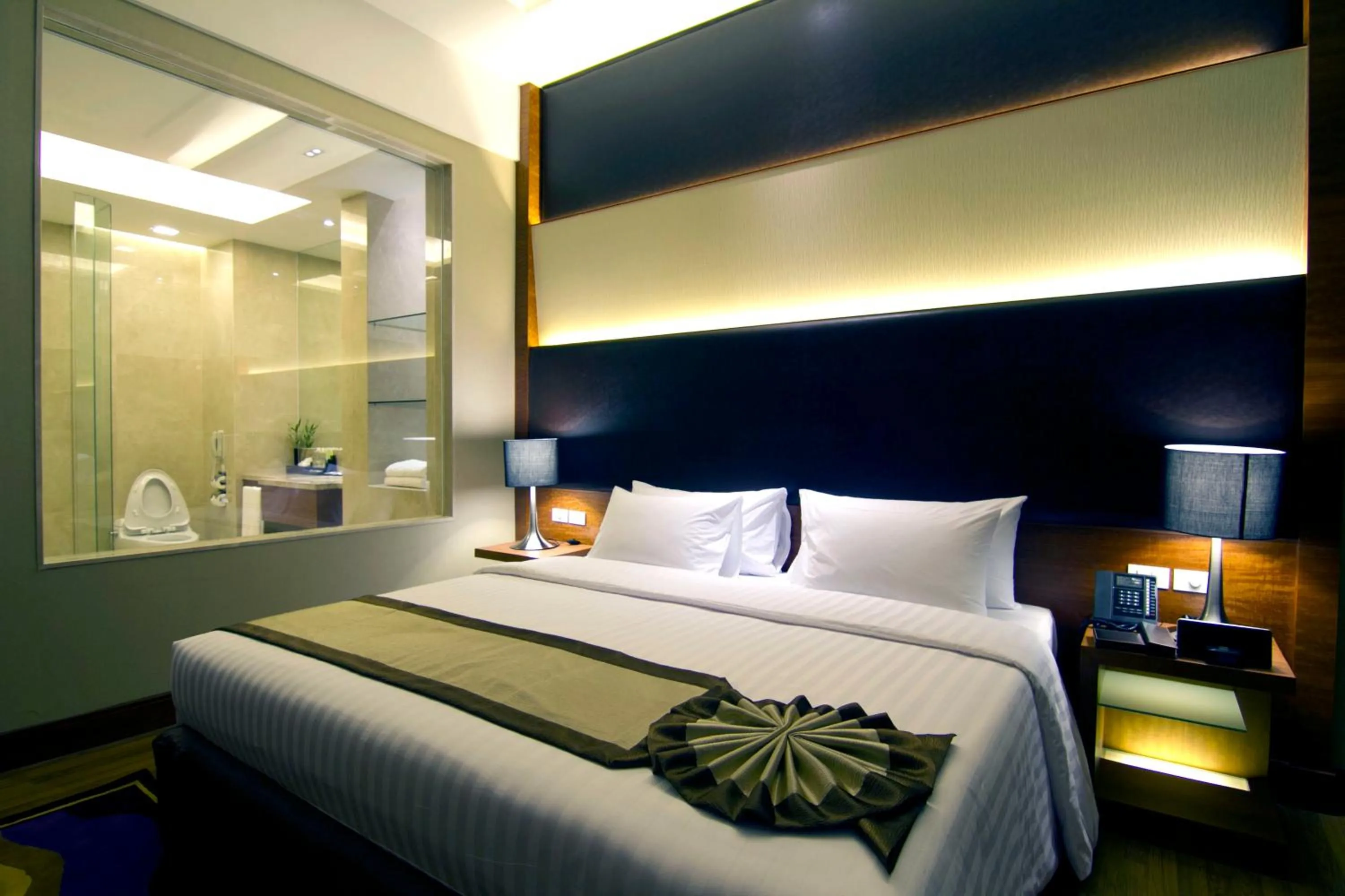 Bed in The Grand Fourwings Convention Hotel Bangkok