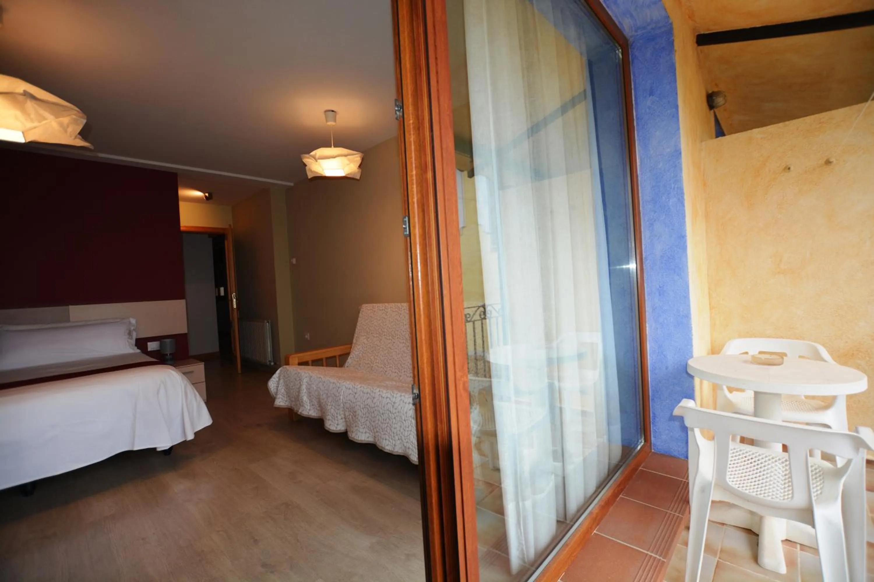 Balcony/Terrace, Bed in Hotel Posada Guadalupe