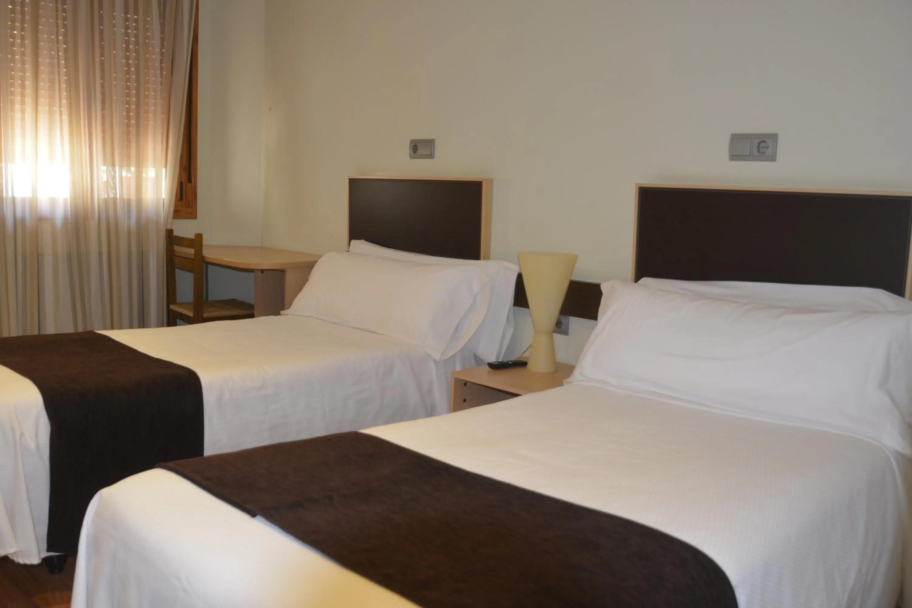 Bed in Hotel Posada Guadalupe