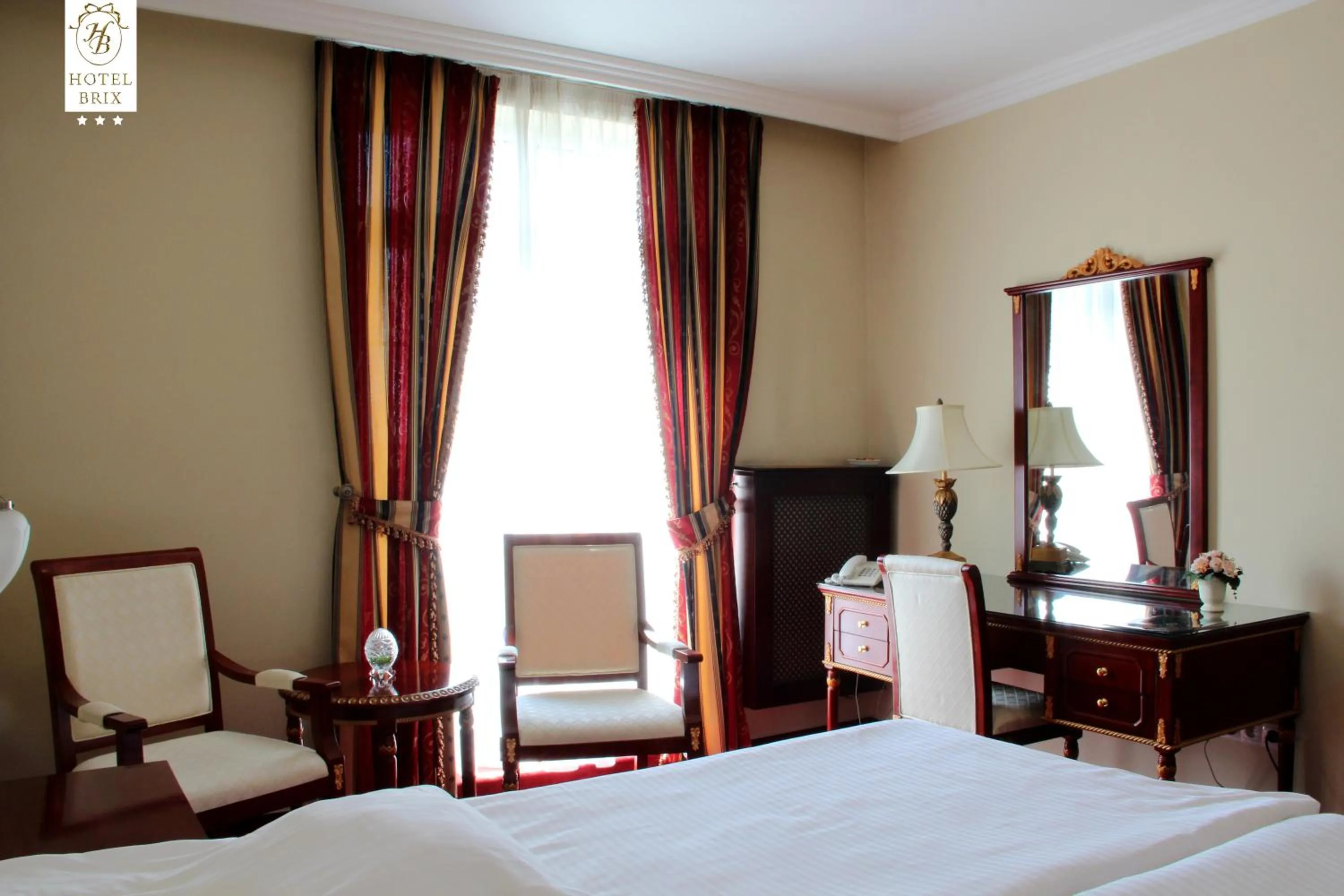 Bed in Luxury Garni Hotel Brix