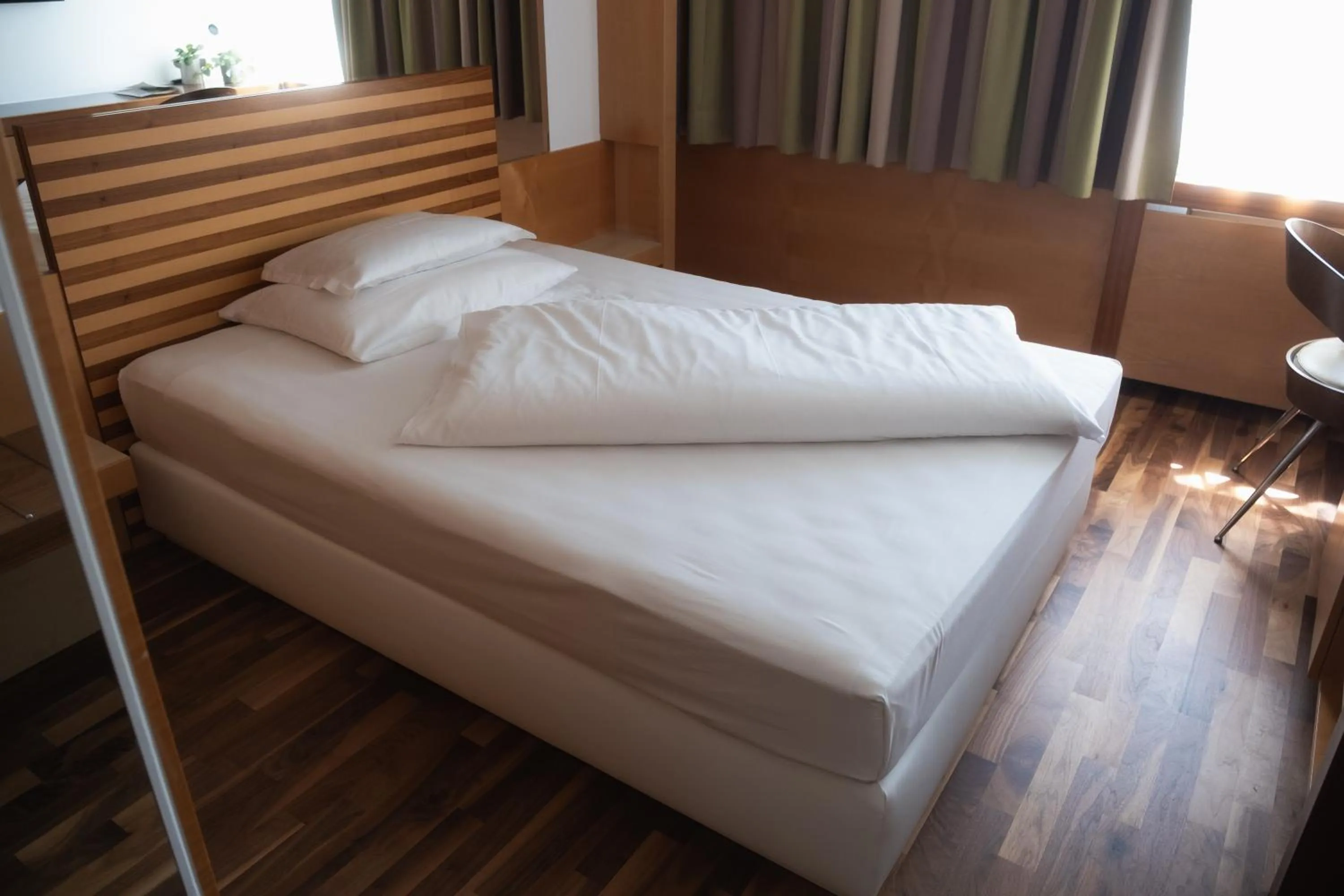 Bed in City-Hotel