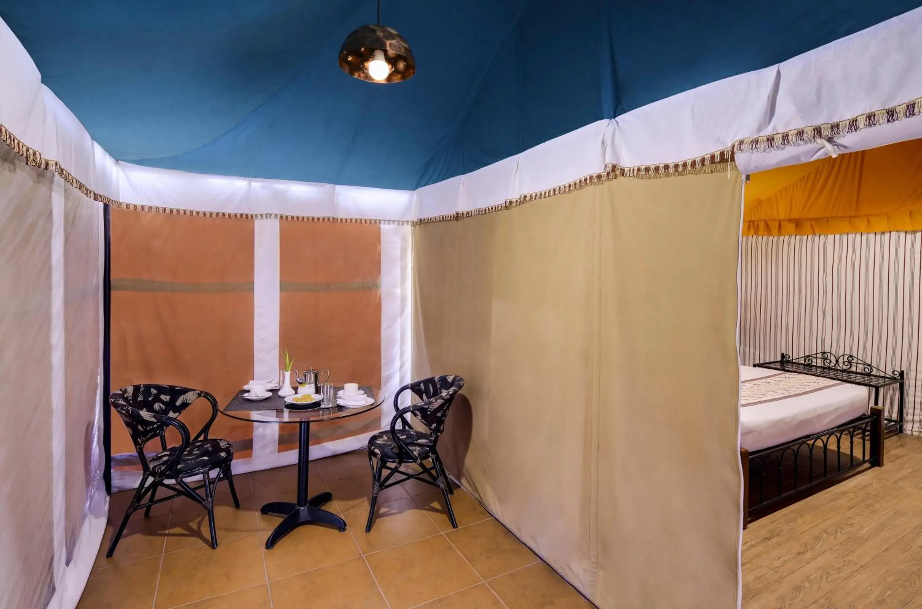 Seating area, Bed in Sterling Kanha Seating area, Bed in Sterling Kanha