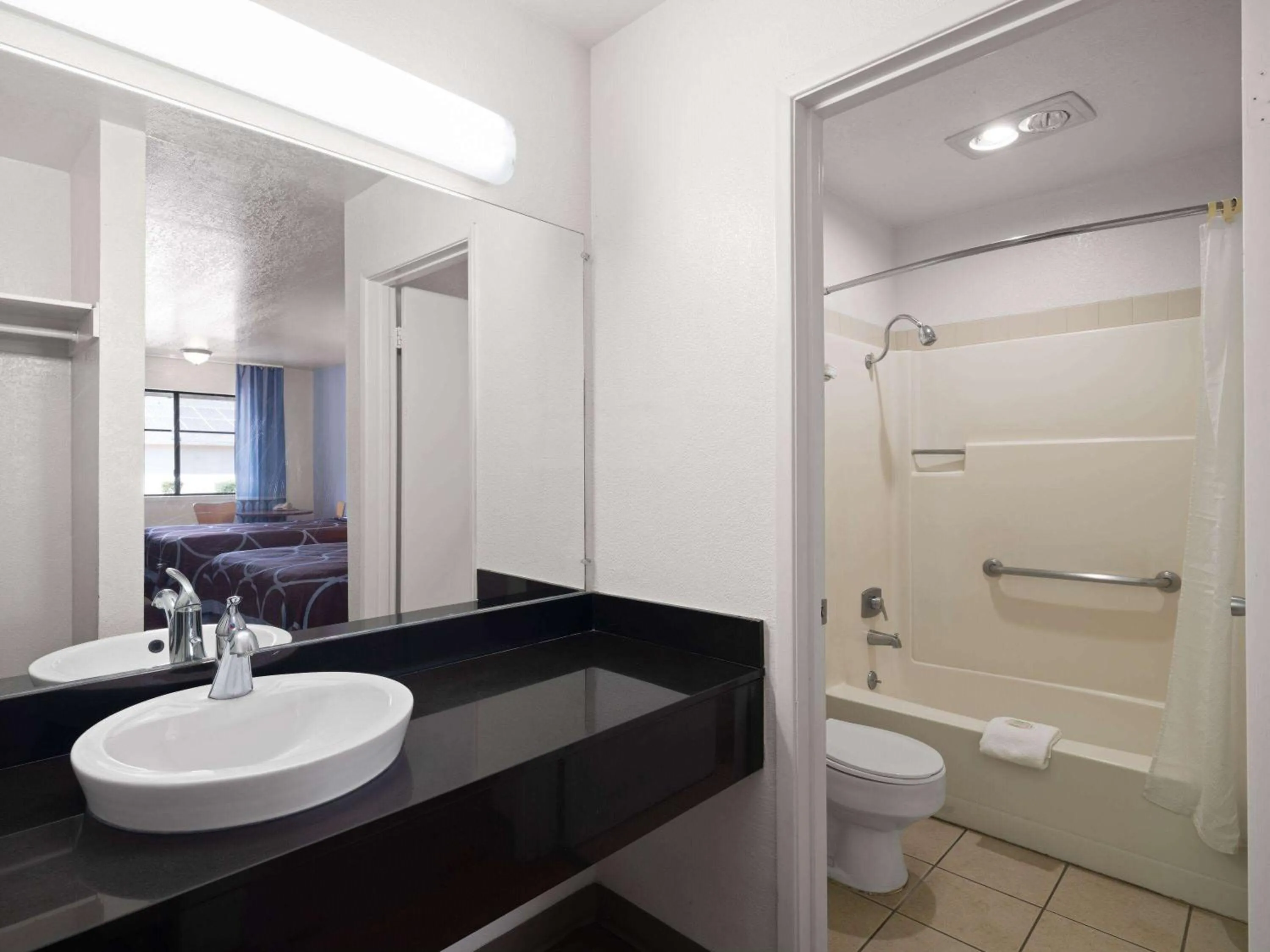 Bathroom in Super 8 by Wyndham Dunnigan