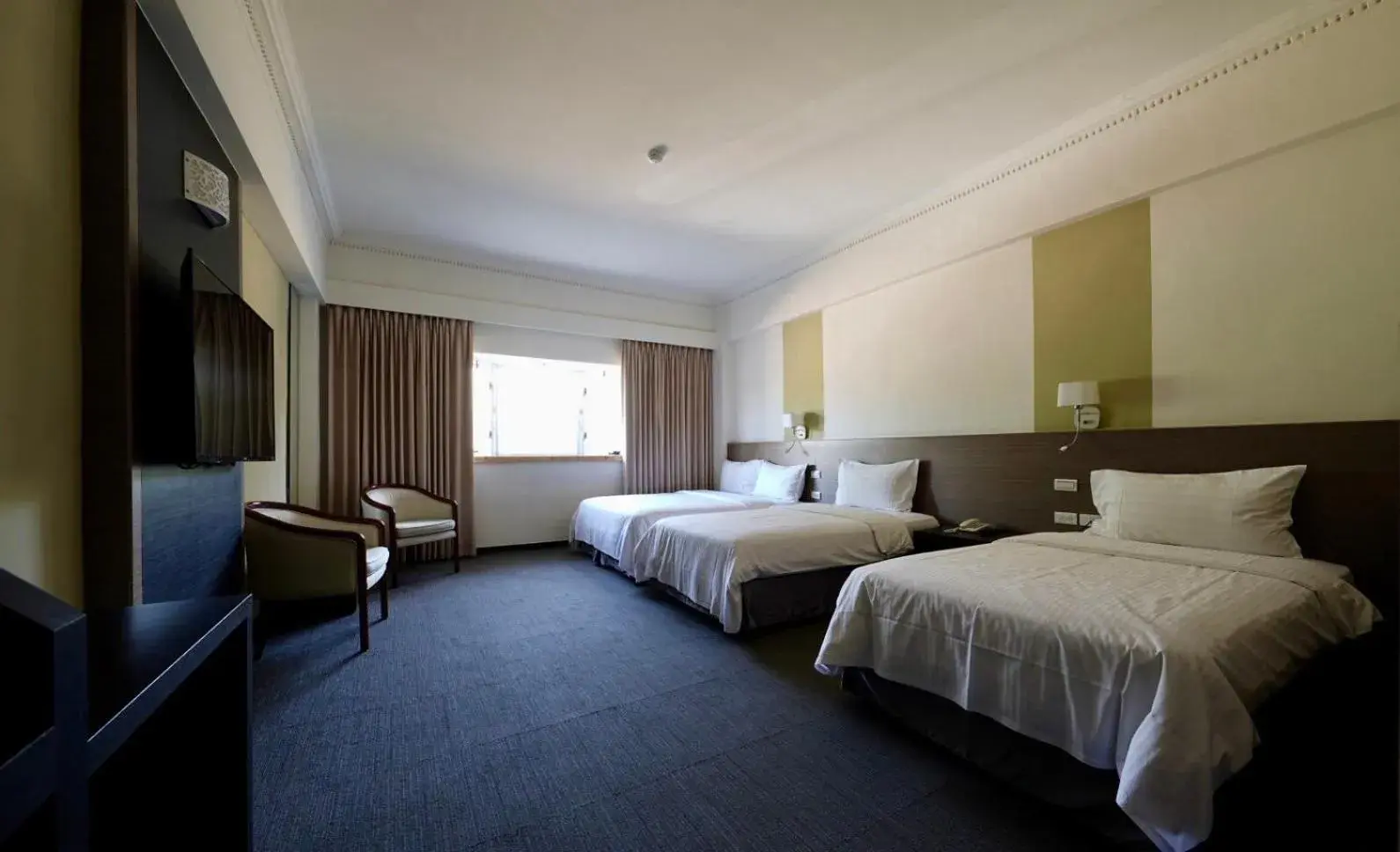 Classic Quadruple Room in Haifu Garden Hotel Classic Quadruple Room in Haifu Garden Hotel