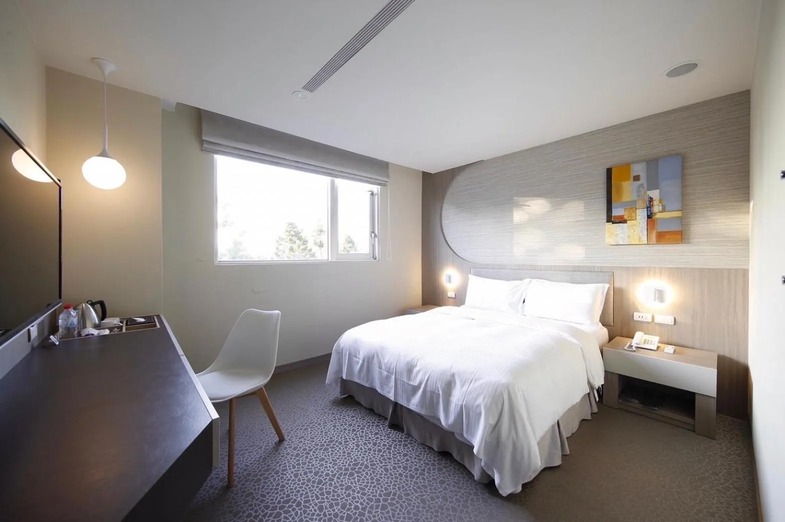 Bed in Hai Fu Hotel & Suites