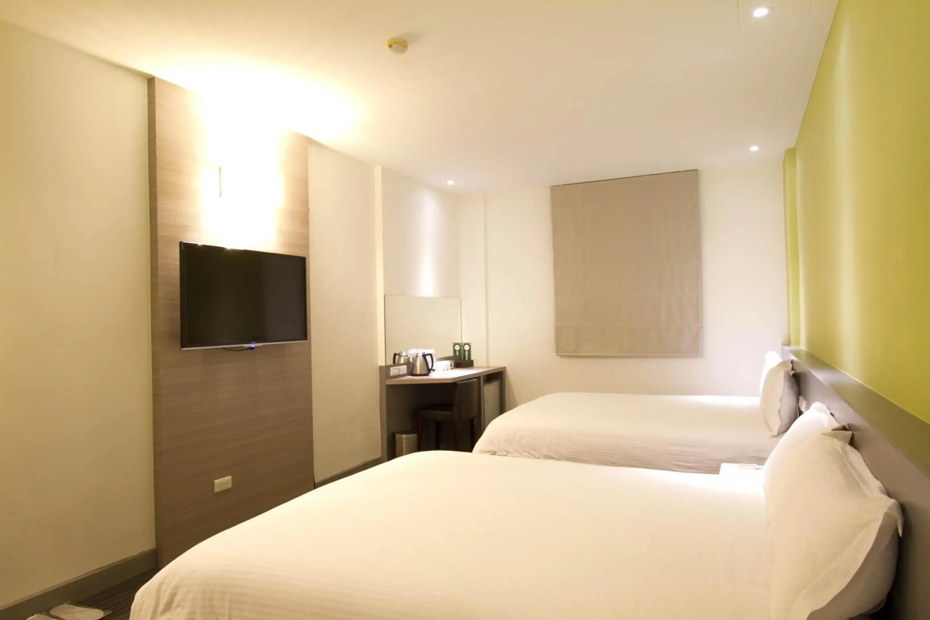 Bed in Hai Fu Hotel & Suites Bed in Hai Fu Hotel & Suites