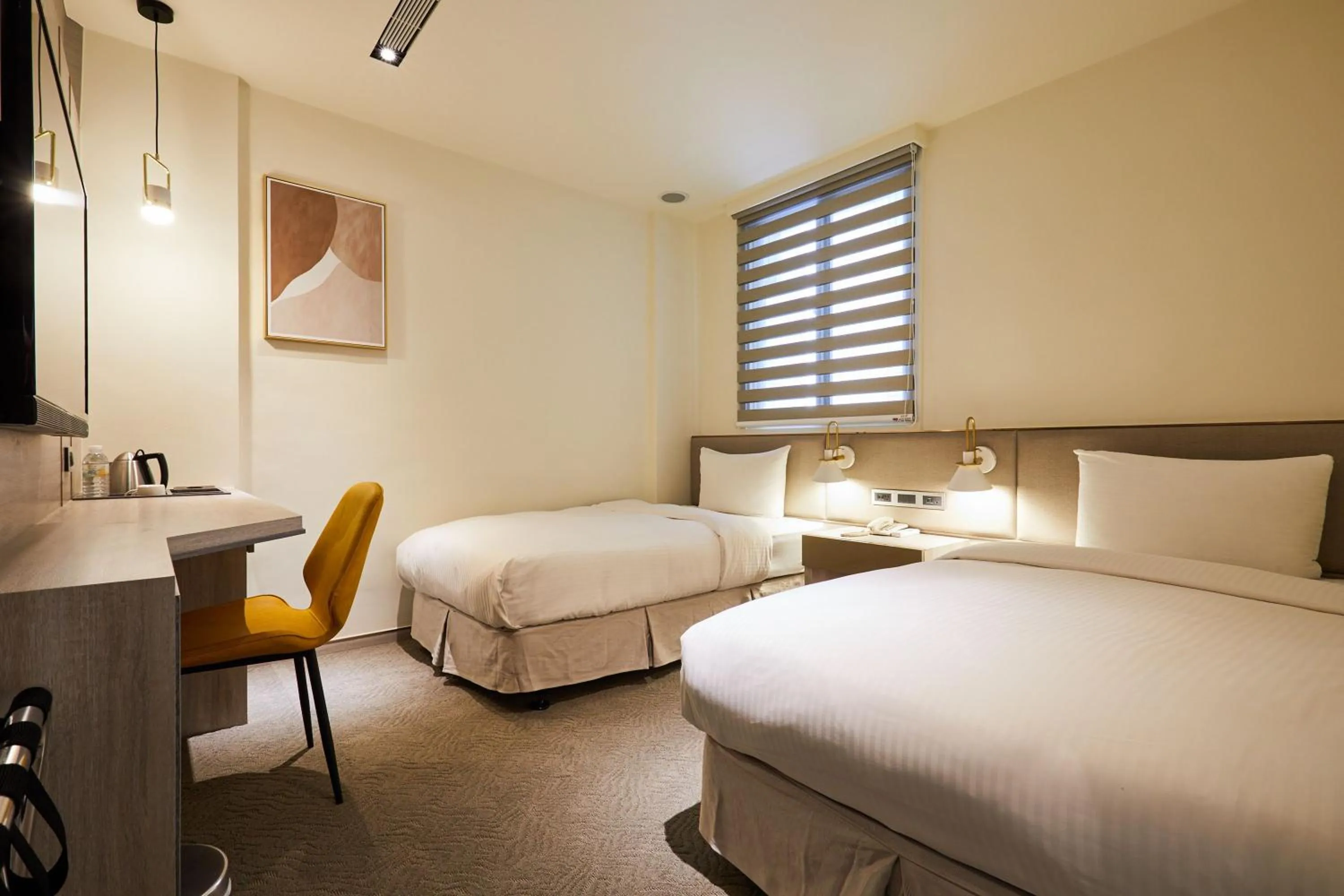 Bed in Hai Fu Hotel & Suites