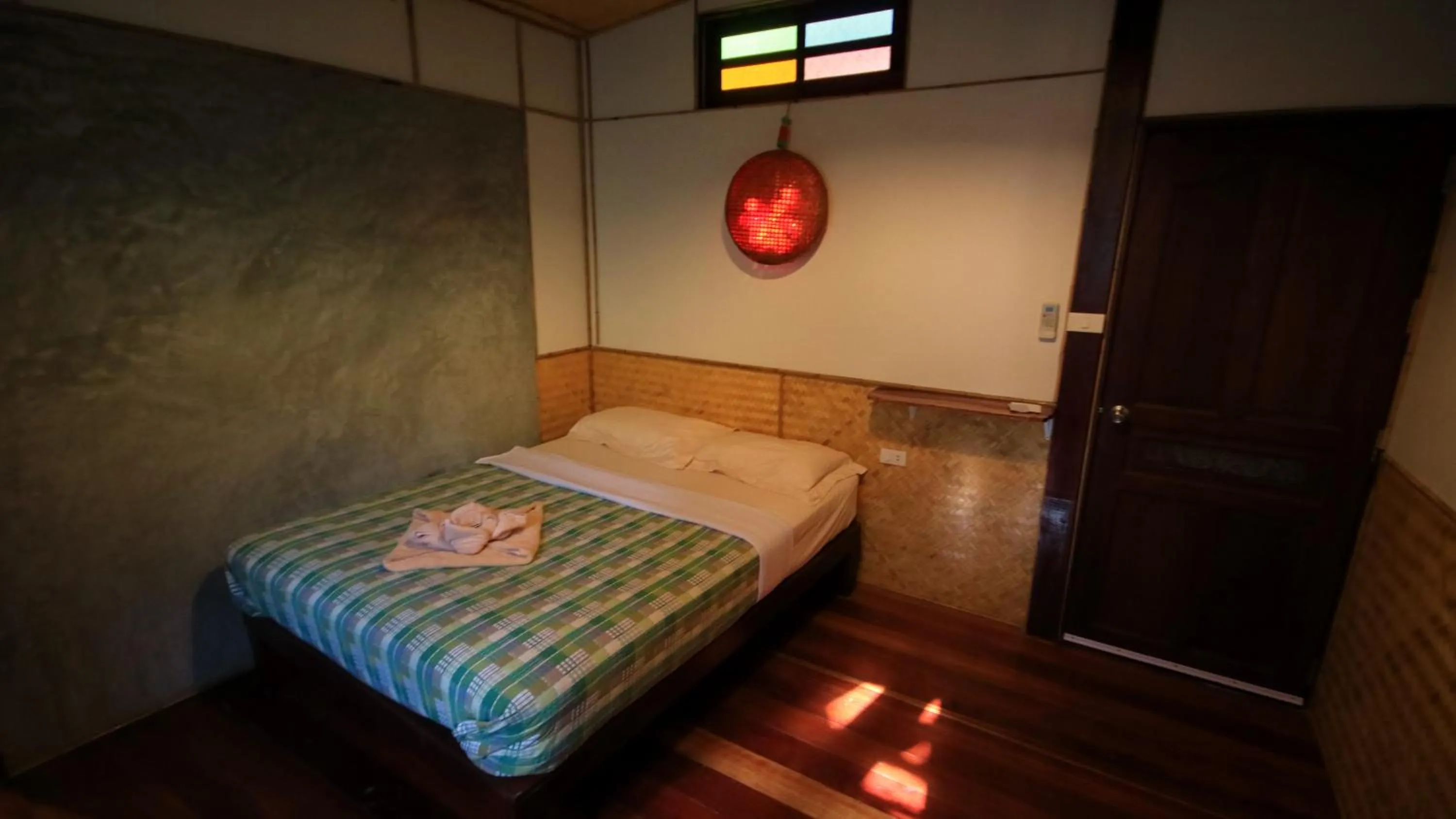 Bed in Longtail Beach Resort