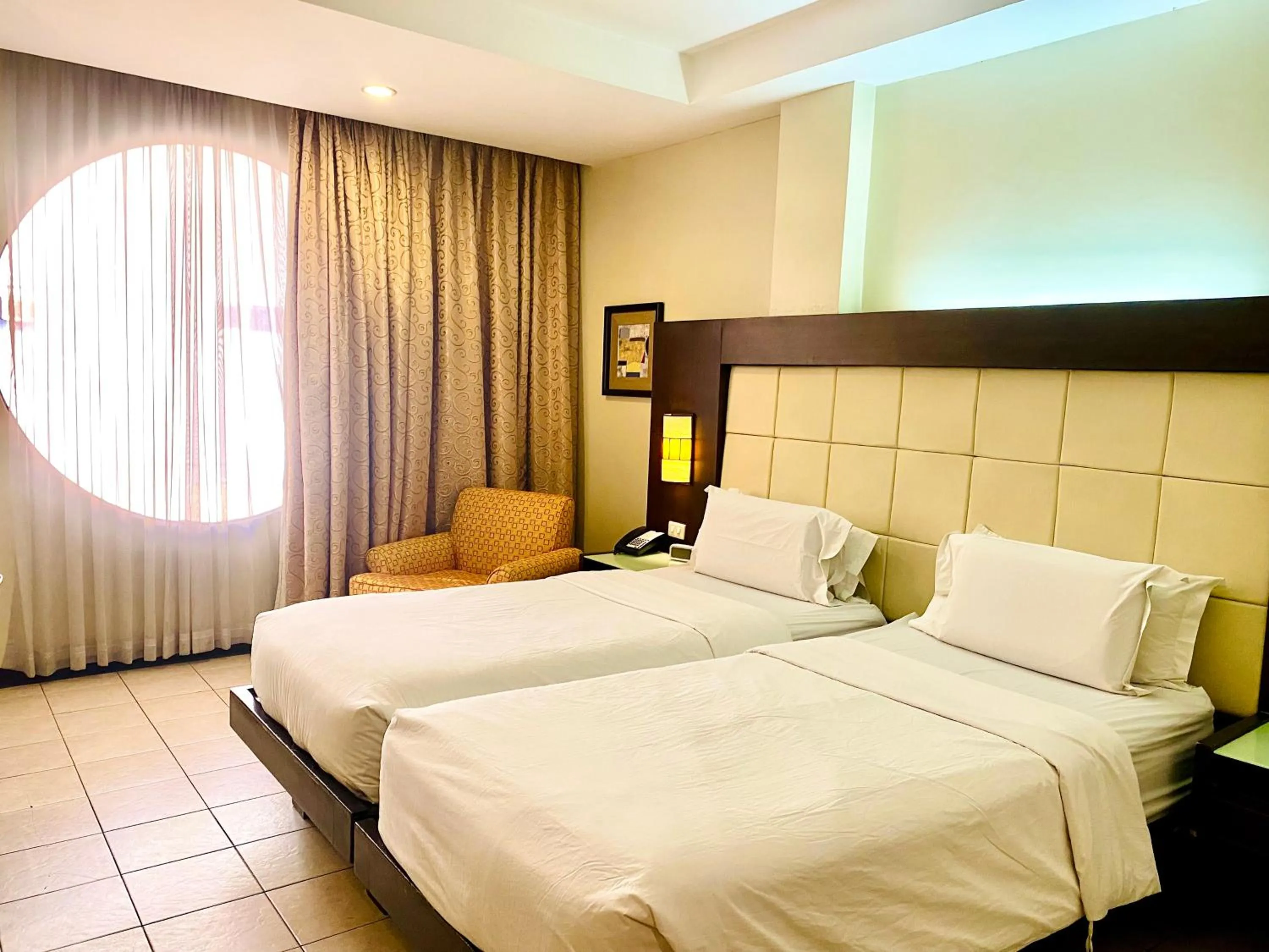 Bedroom, Bed in Circle Inn Hotel and Suites Bacolod