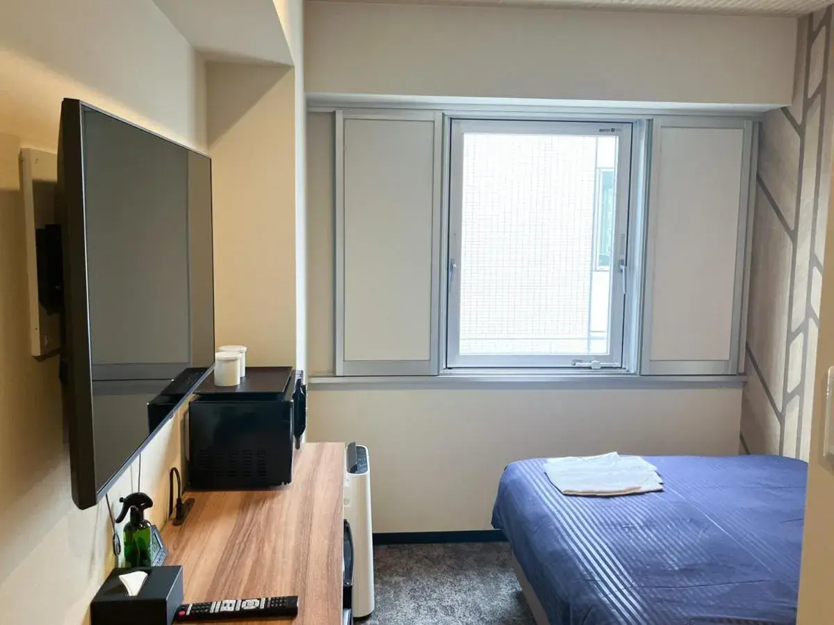 Bed in HOTEL LiVEMAX BUDGET Hiratsuka Ekimae Bed in HOTEL LiVEMAX BUDGET Hiratsuka Ekimae