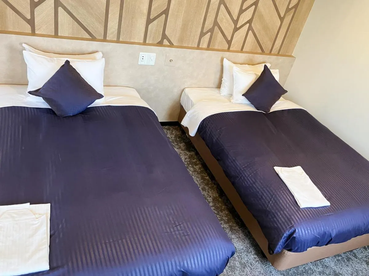 Bed in HOTEL LiVEMAX BUDGET Hiratsuka Ekimae