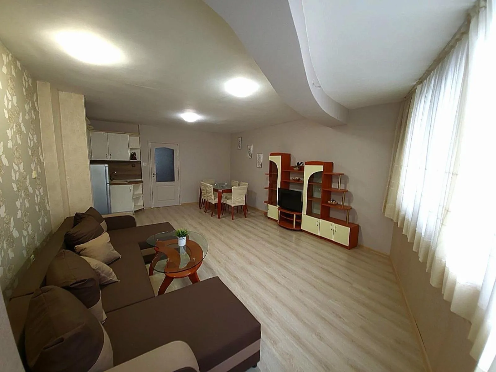 Communal lounge/ TV room in Lux Apartment Sisi