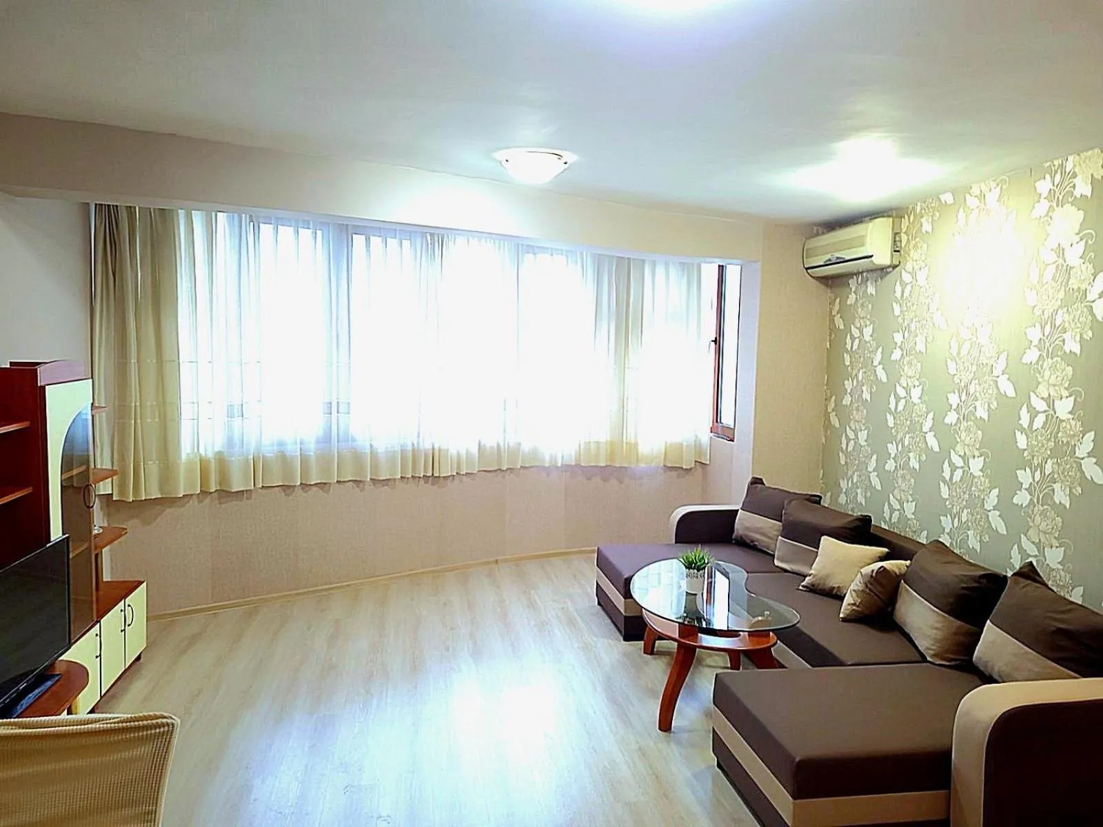 Communal lounge/ TV room in Lux Apartment Sisi