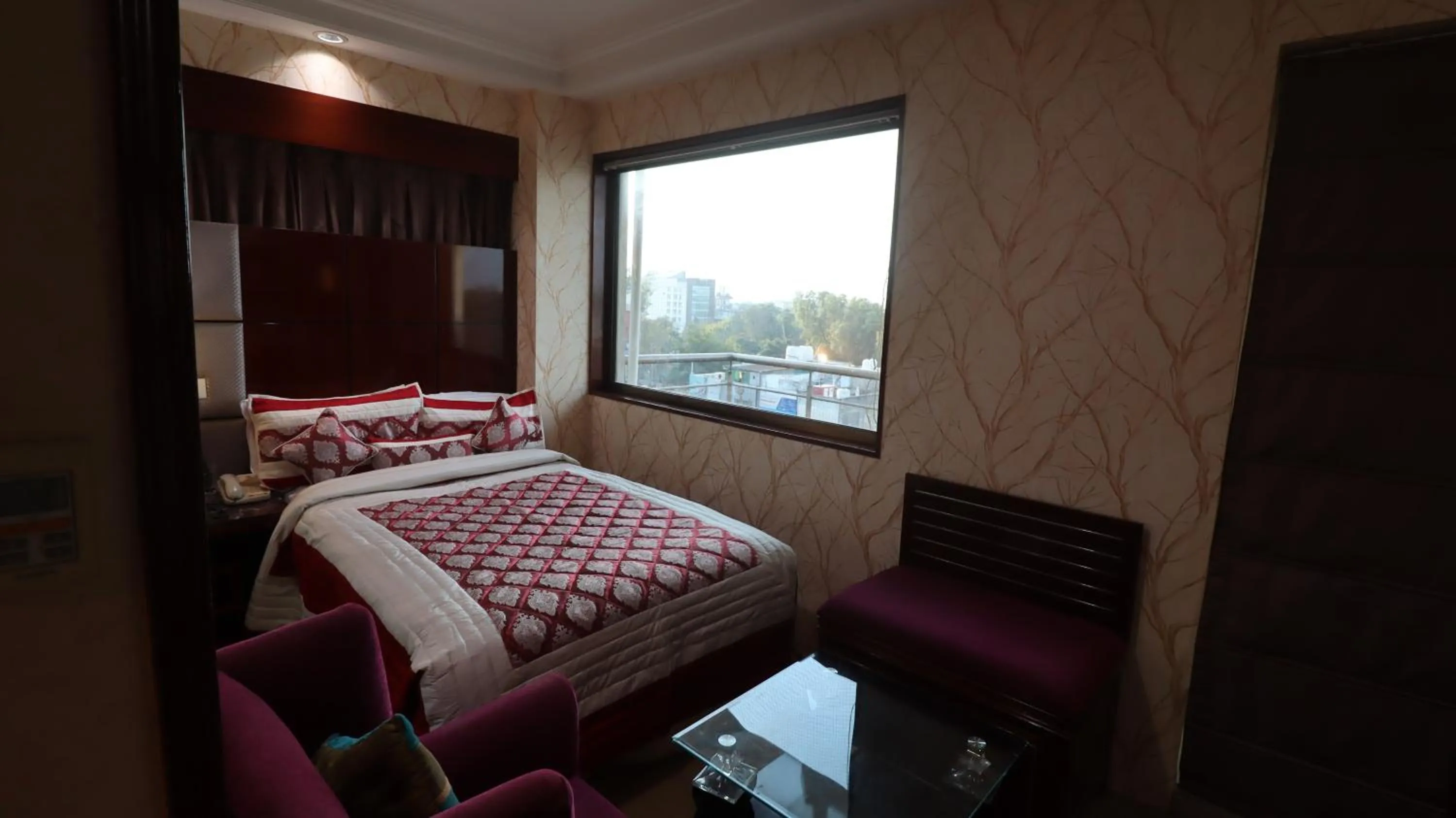 Bed in SkyCity Hotel Gurgaon