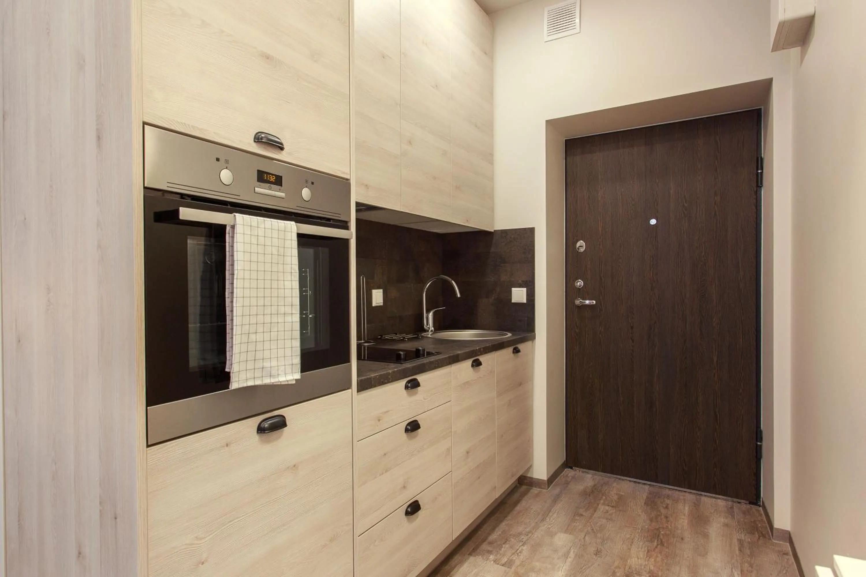 Kitchen or kitchenette in Old Town Trio Apartments