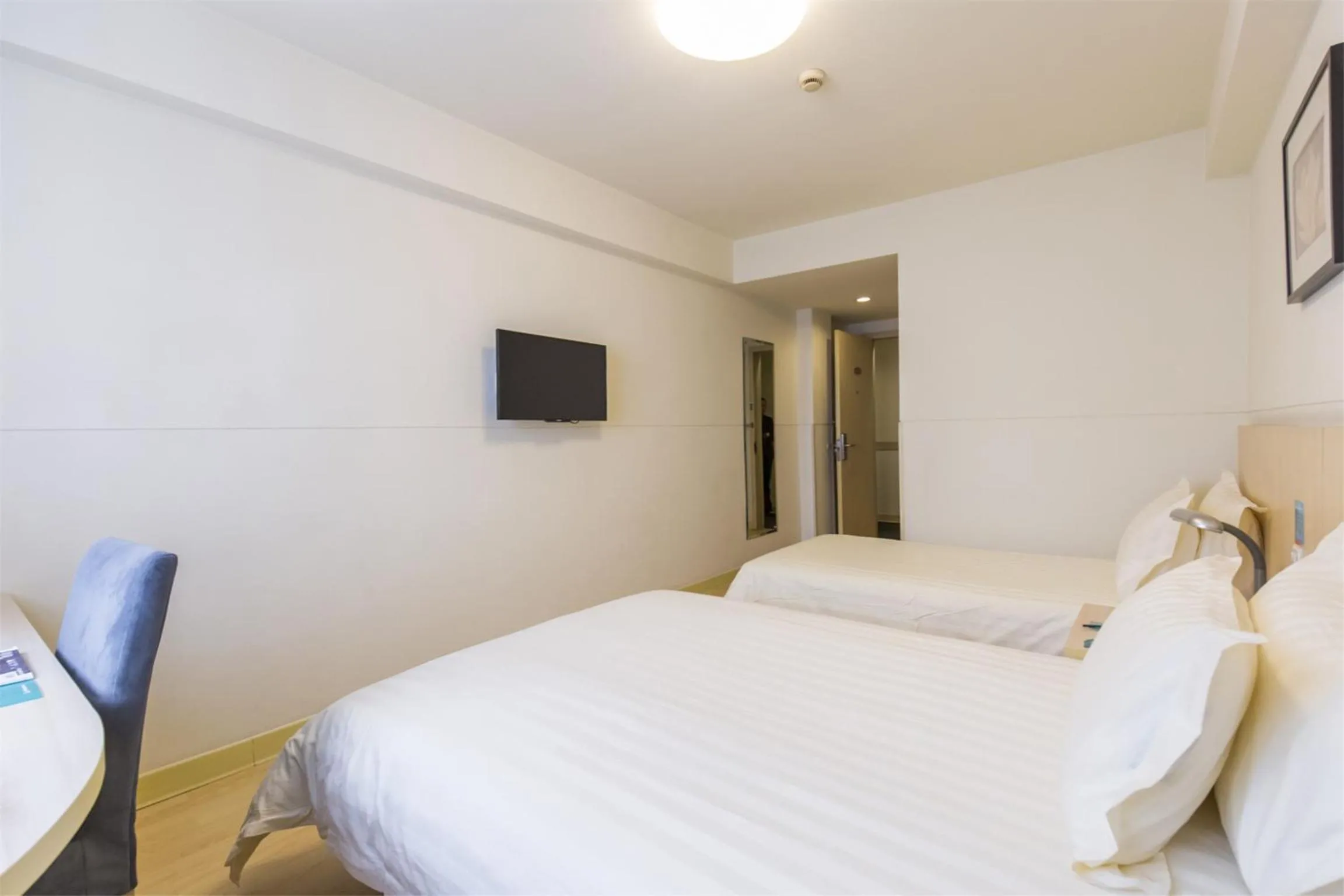 Bed in Jinjiang Inn Select Dunhuang Miaojie