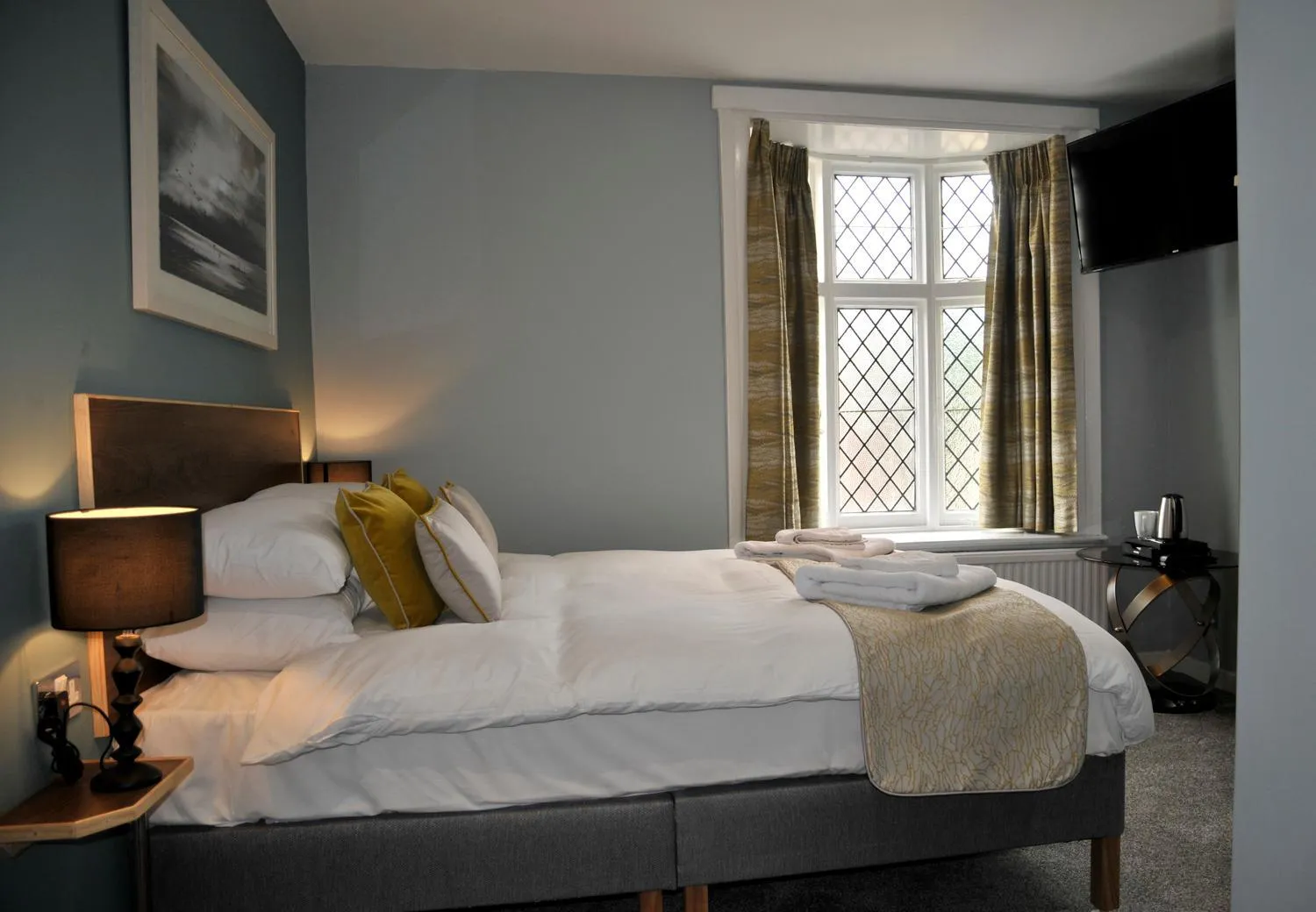 Bed in The Coach Hotel